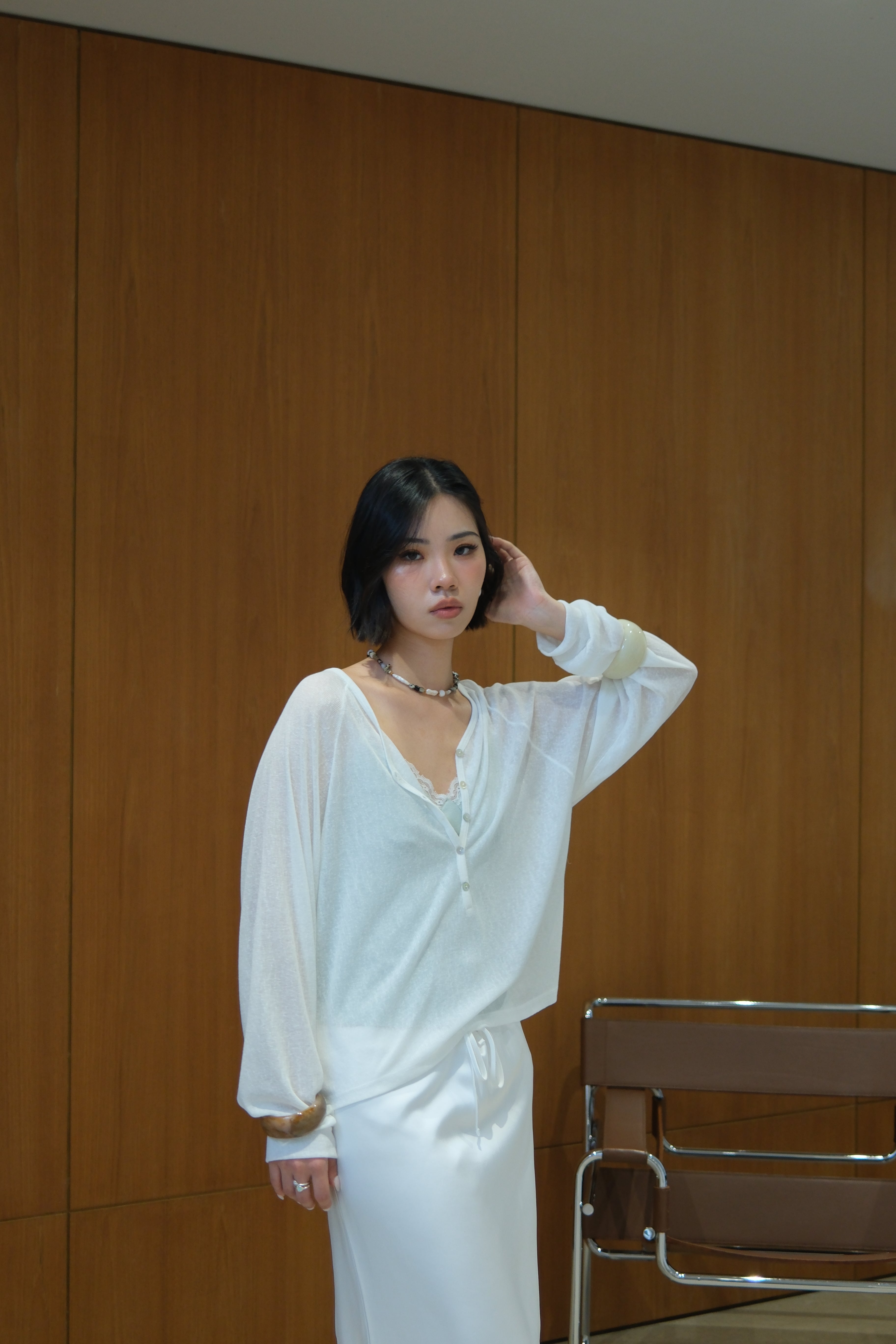 Linear V-Neck Half-Button Top