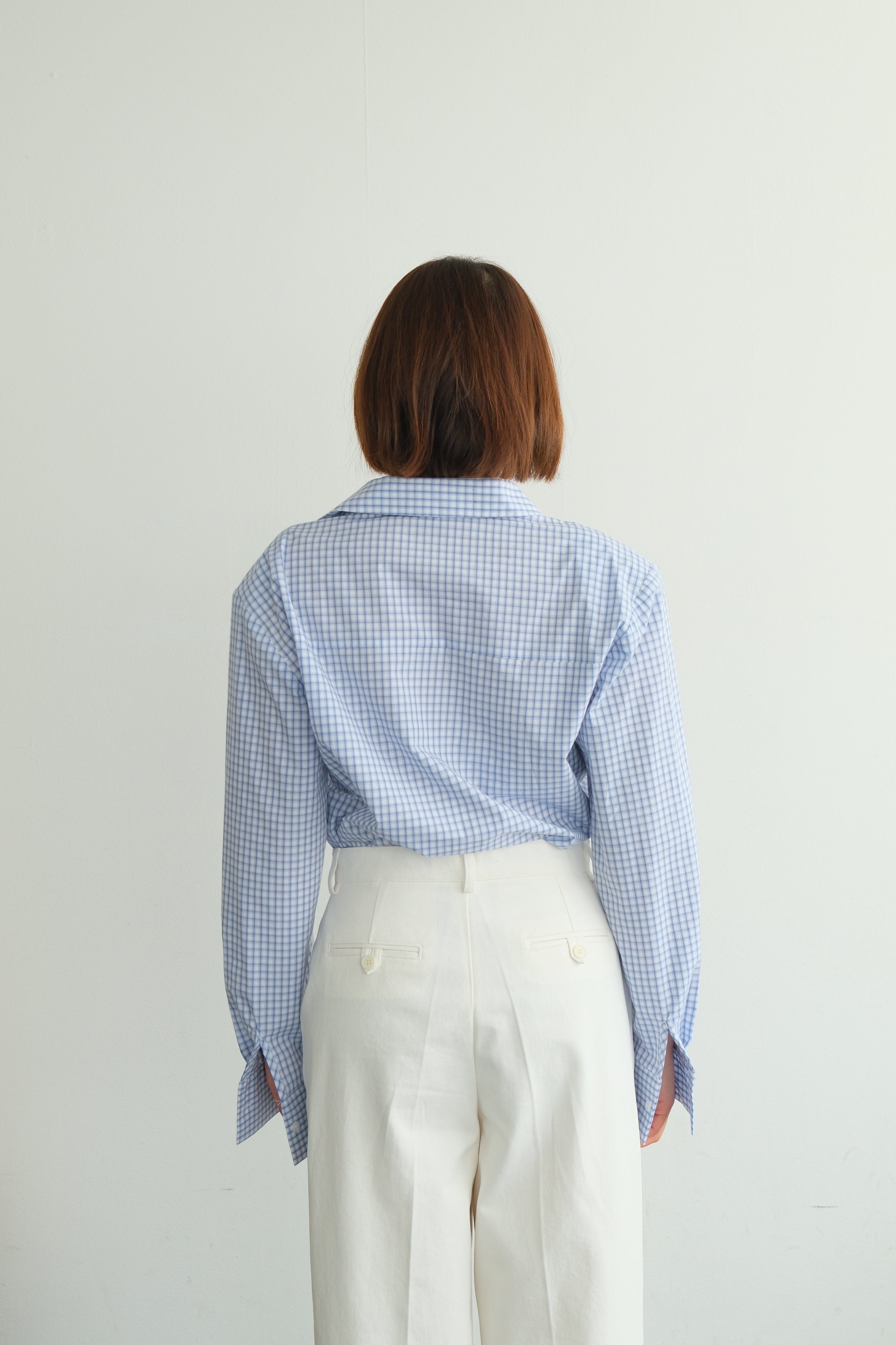 V-Neck Shirt with Pleated Detail & Shoulder Pads