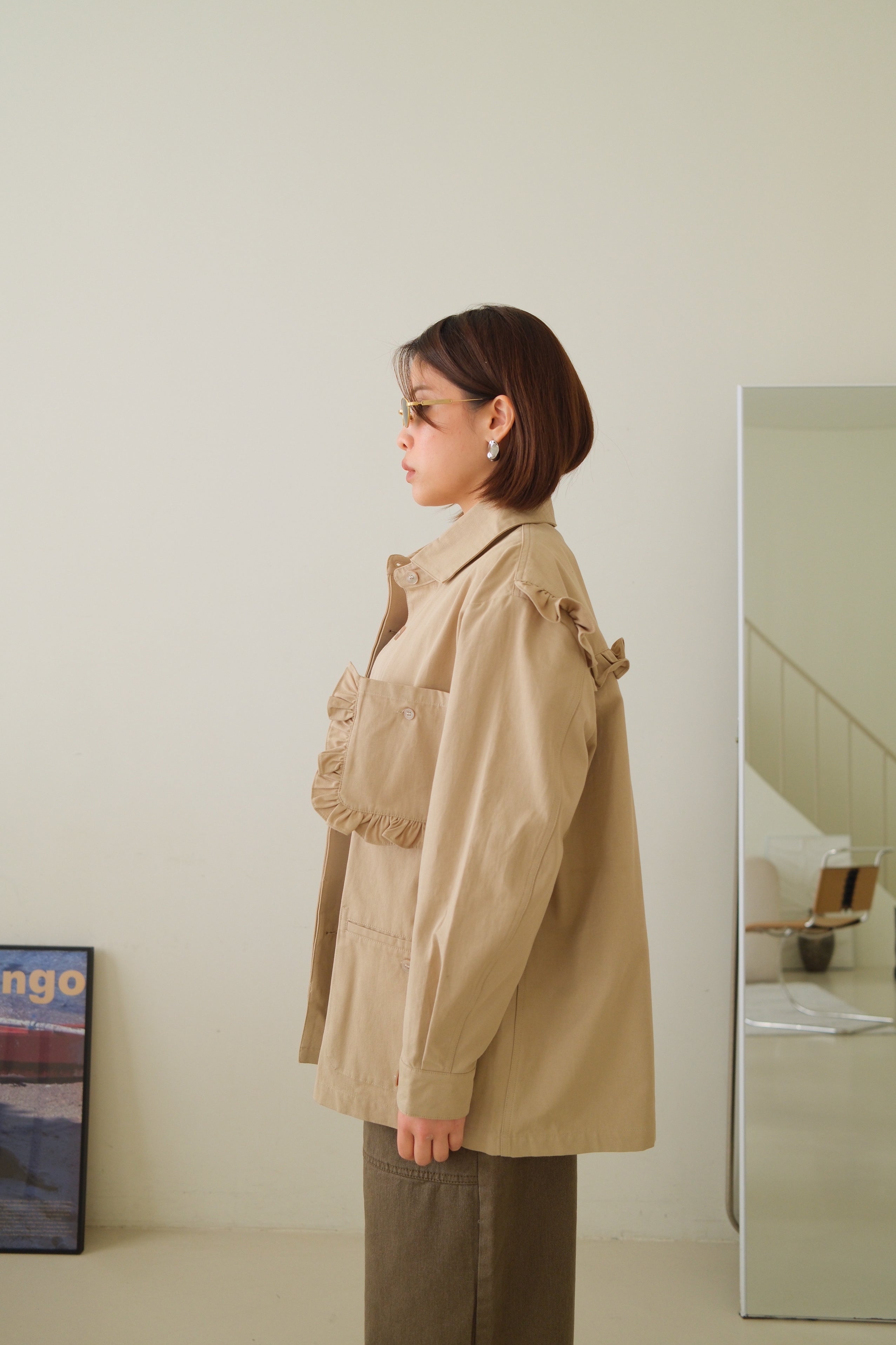 Frill jacket with removable pocket