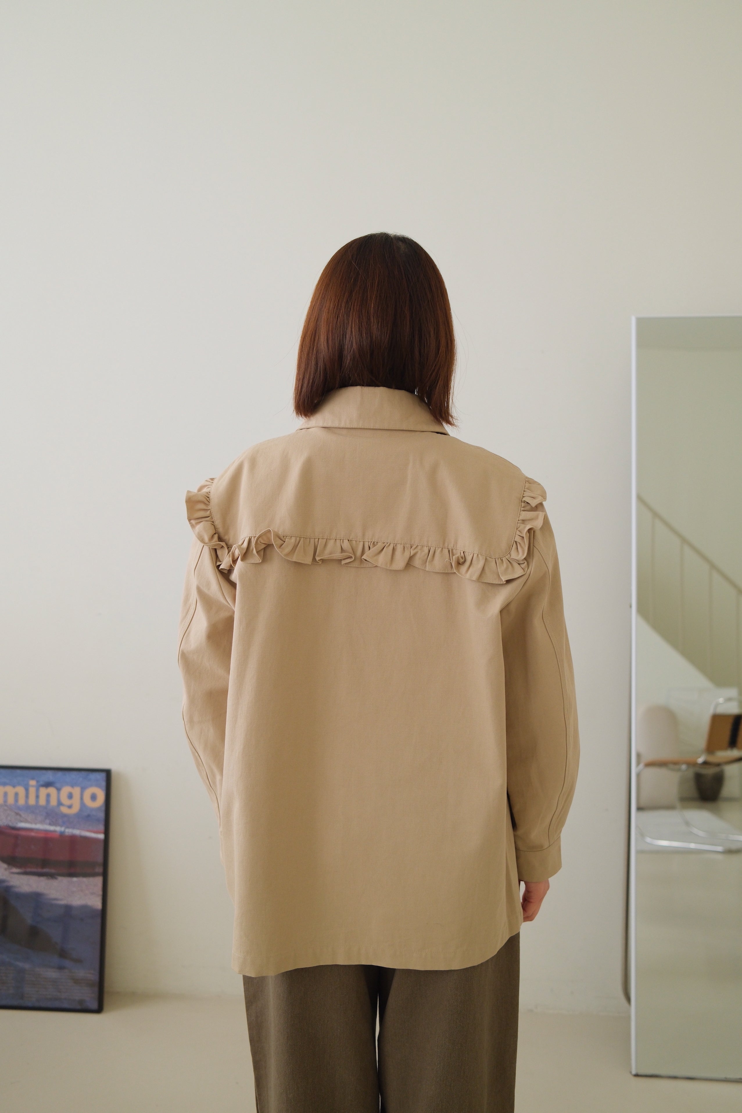 Frill jacket with removable pocket