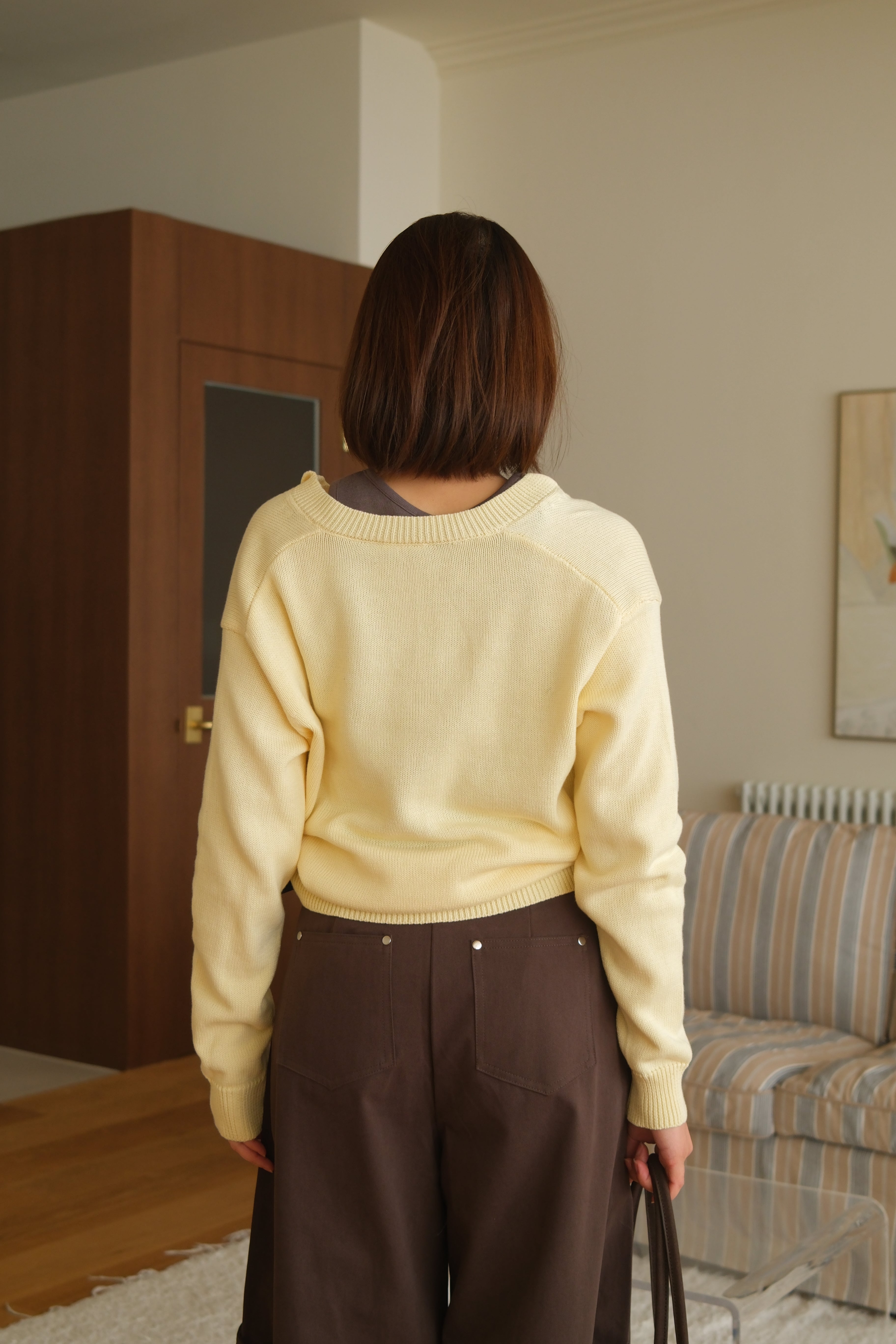 Deep v neck bold button knit sweatshirt