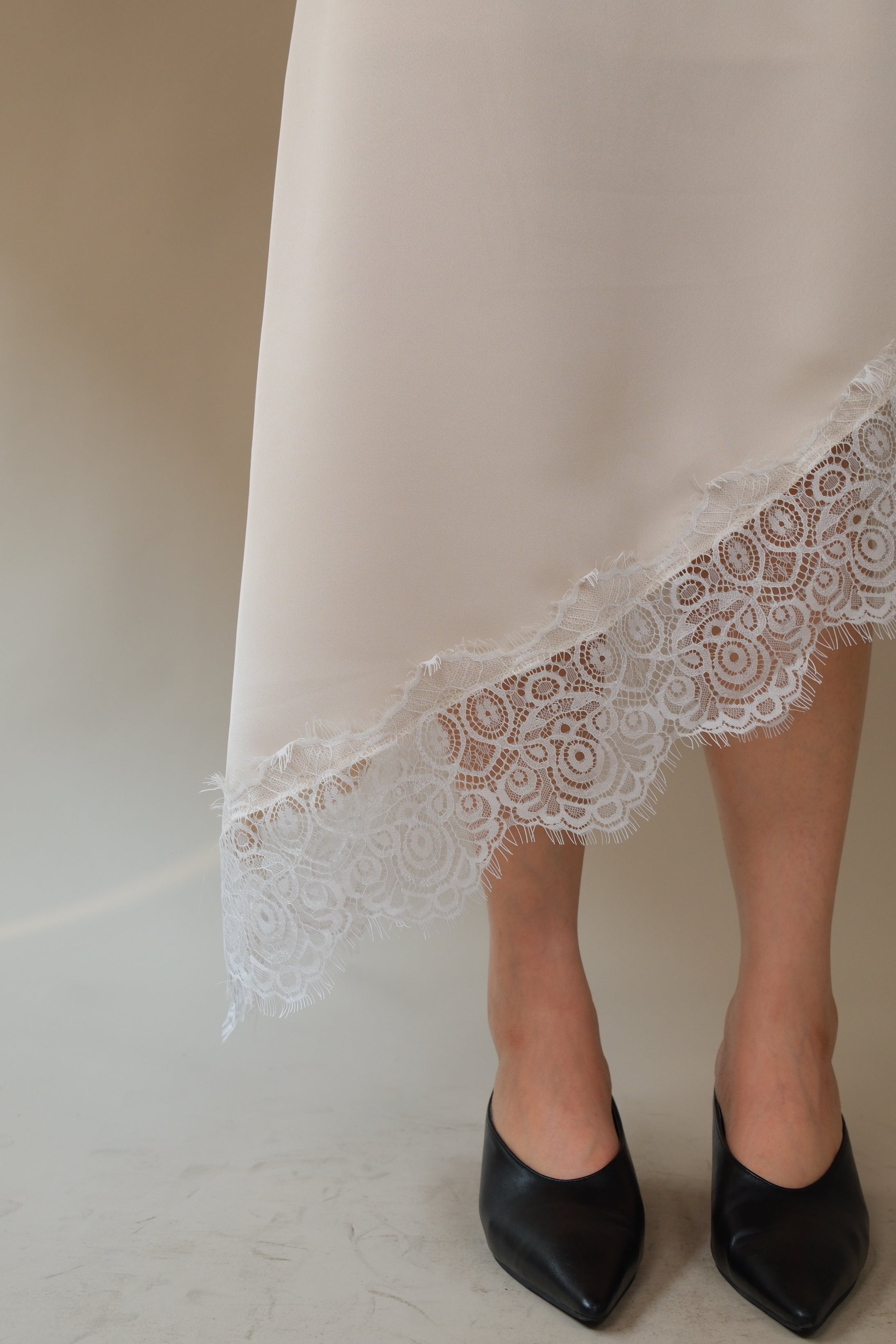 Klaire lace hem unbalance silky skirt