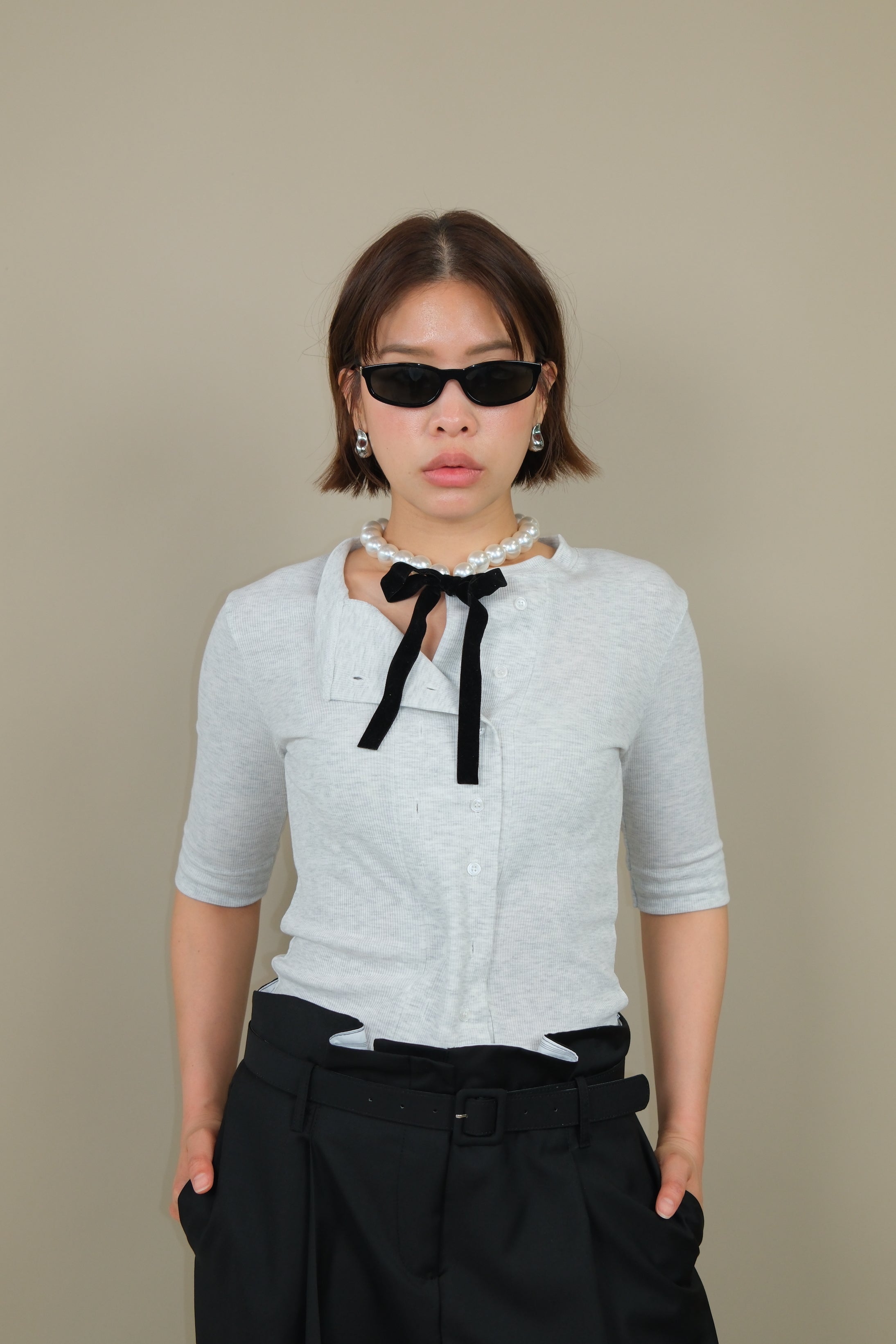 Messy buttoned cotton-ribbed top