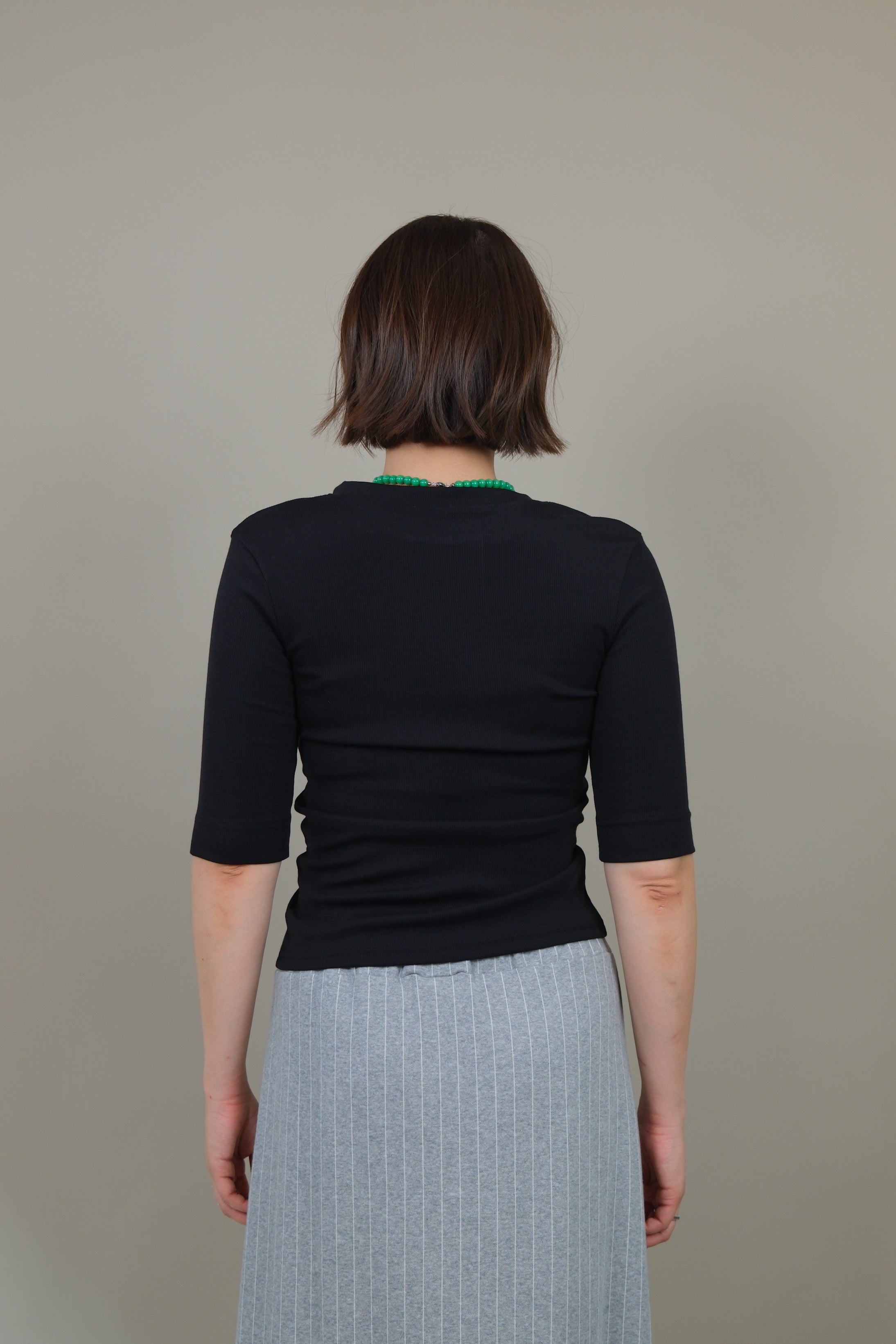 Messy buttoned cotton-ribbed top