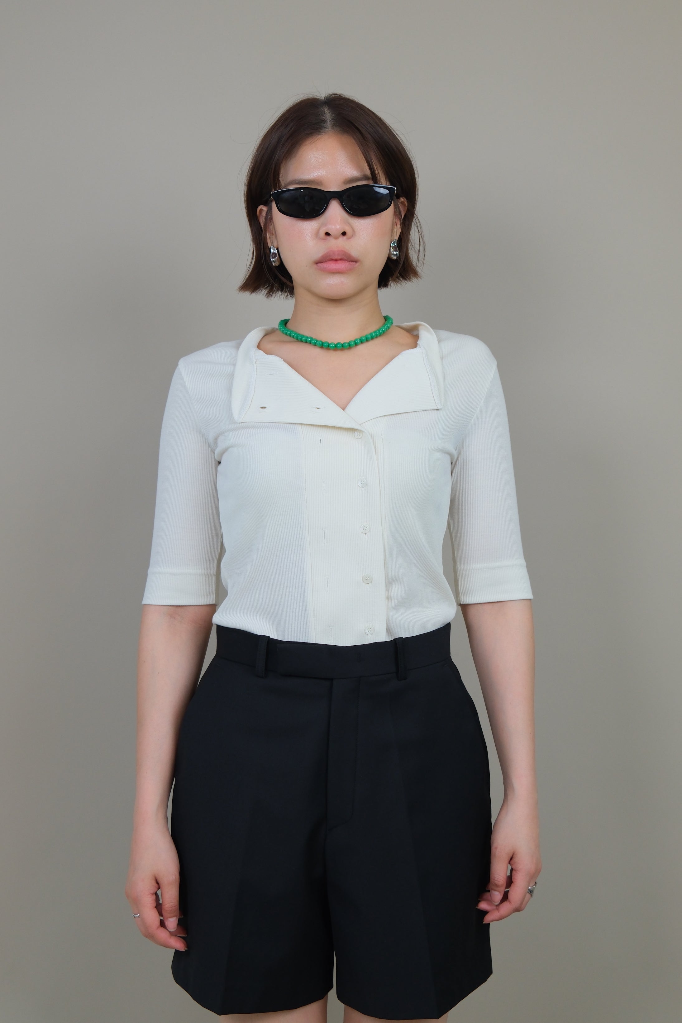 Messy buttoned cotton-ribbed top