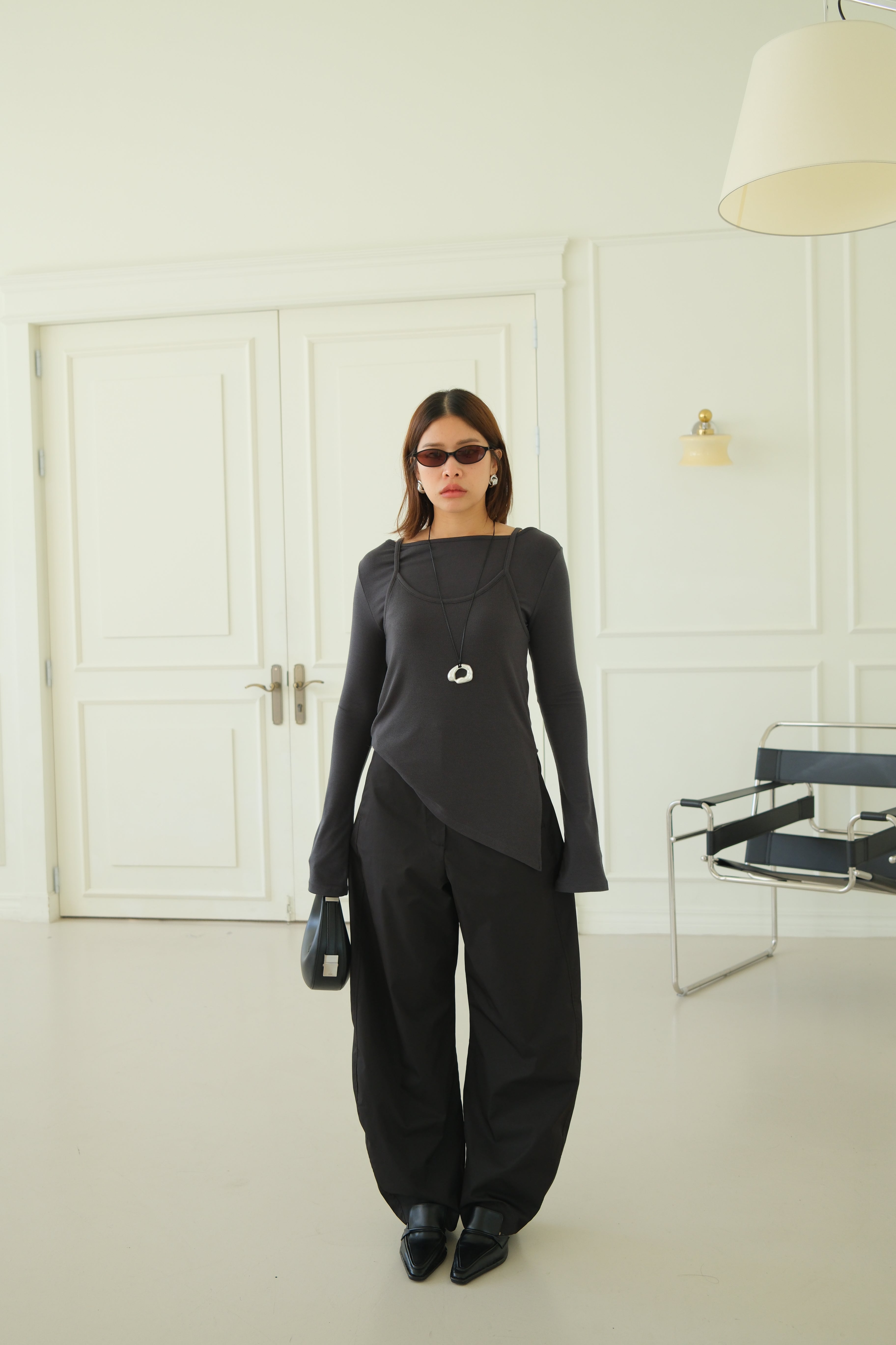 high-rise curved silhouette pants