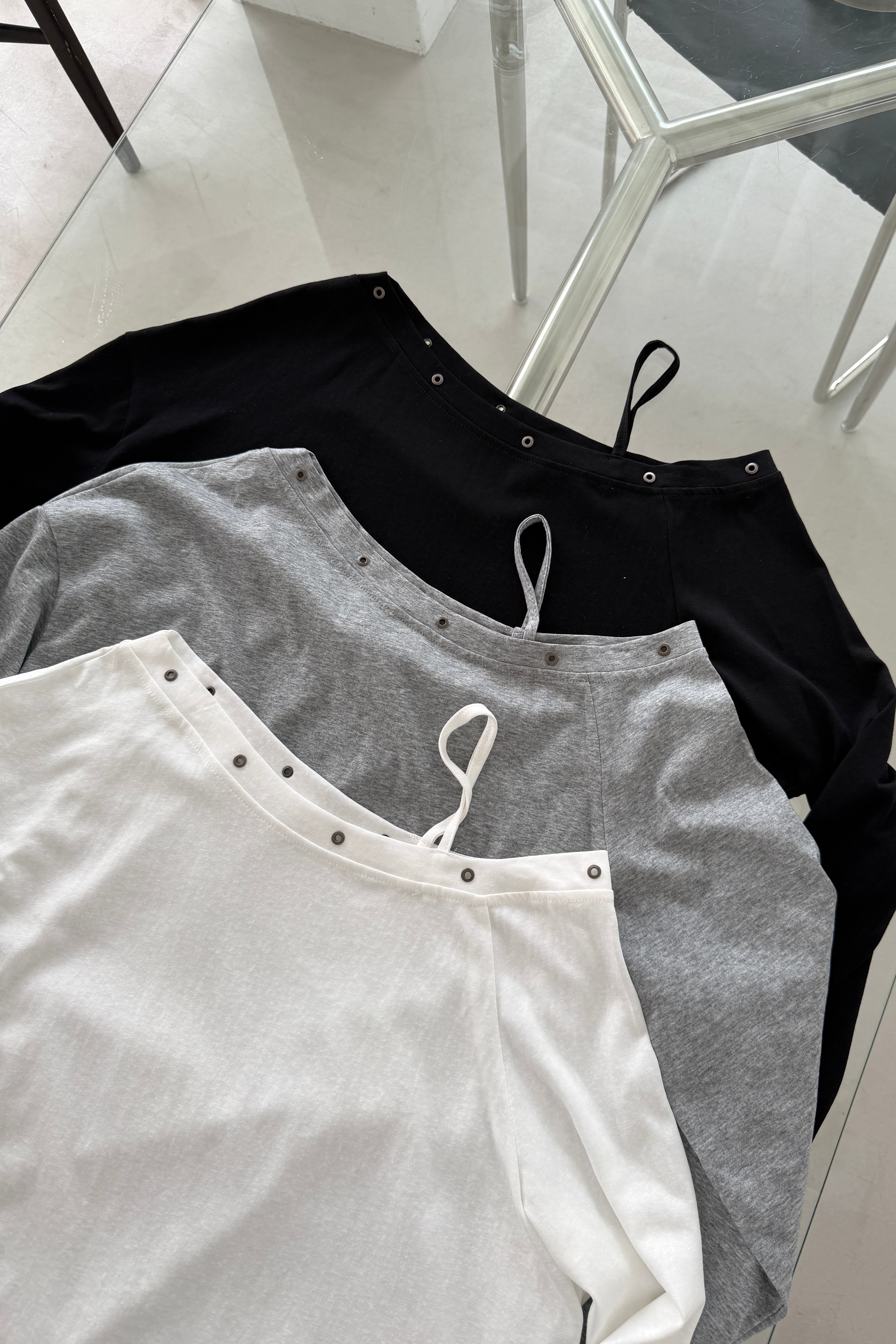 Asymmetric Shoulder Eyelet Top