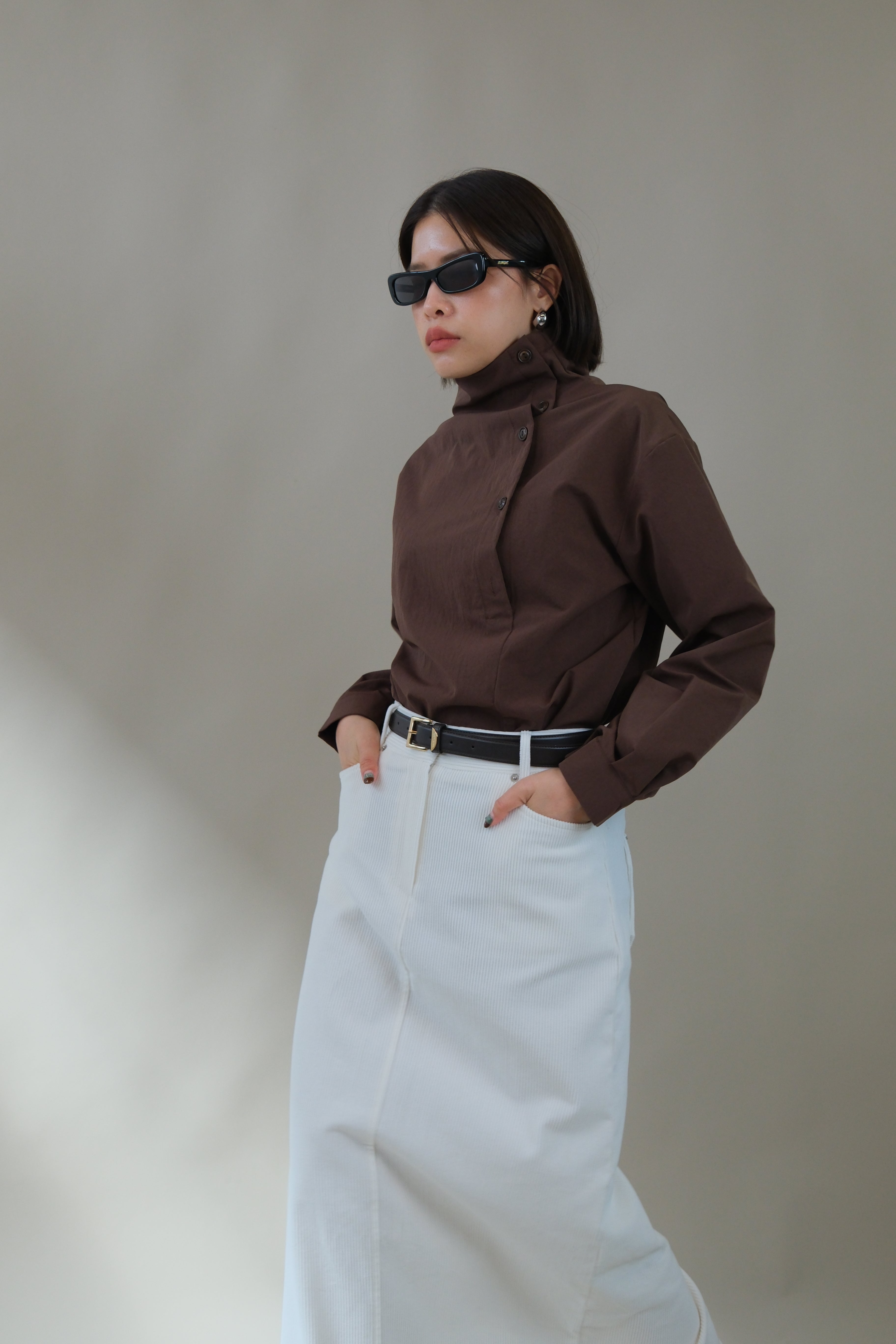 Funnel neck asym button blouse