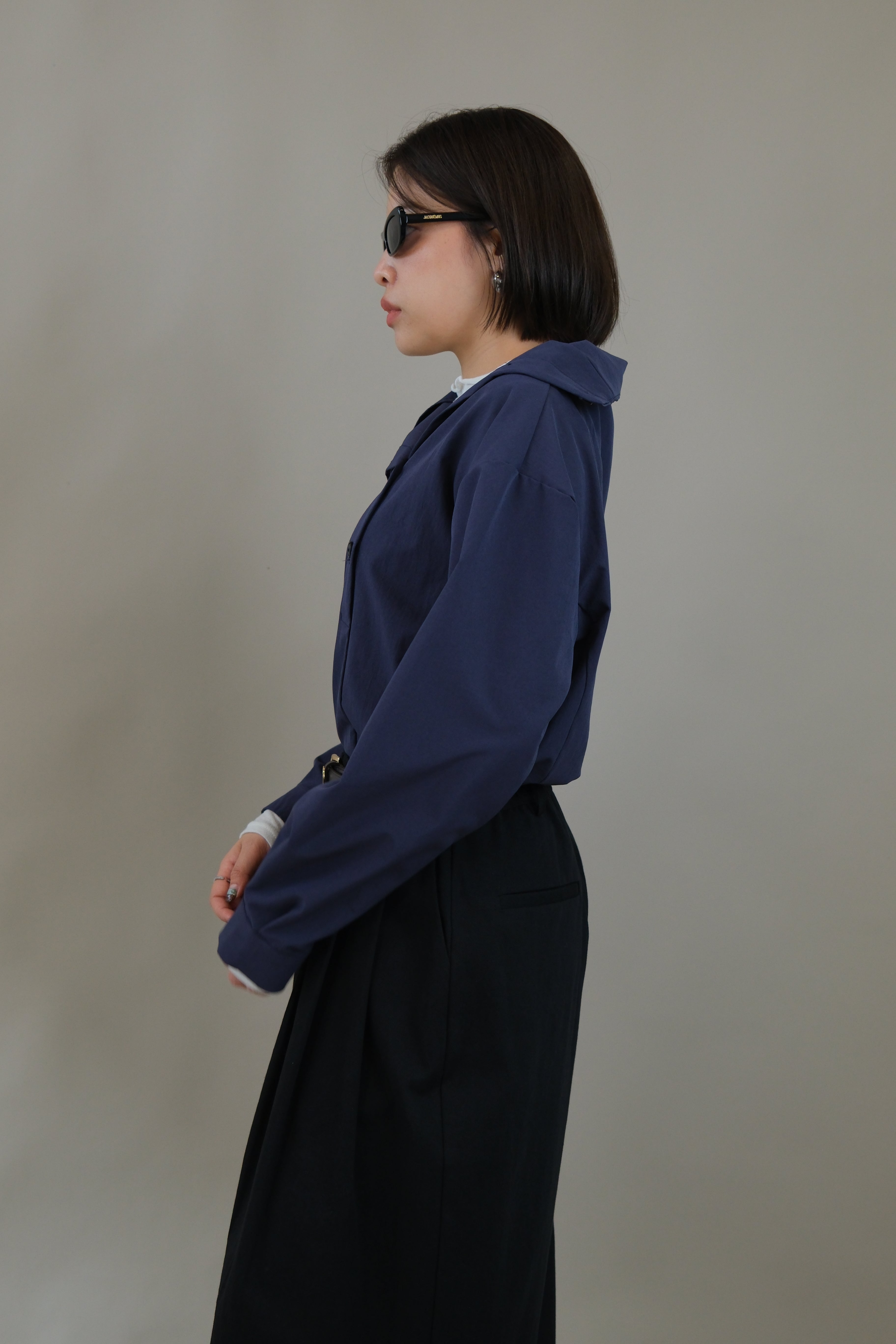 Funnel neck asym button blouse