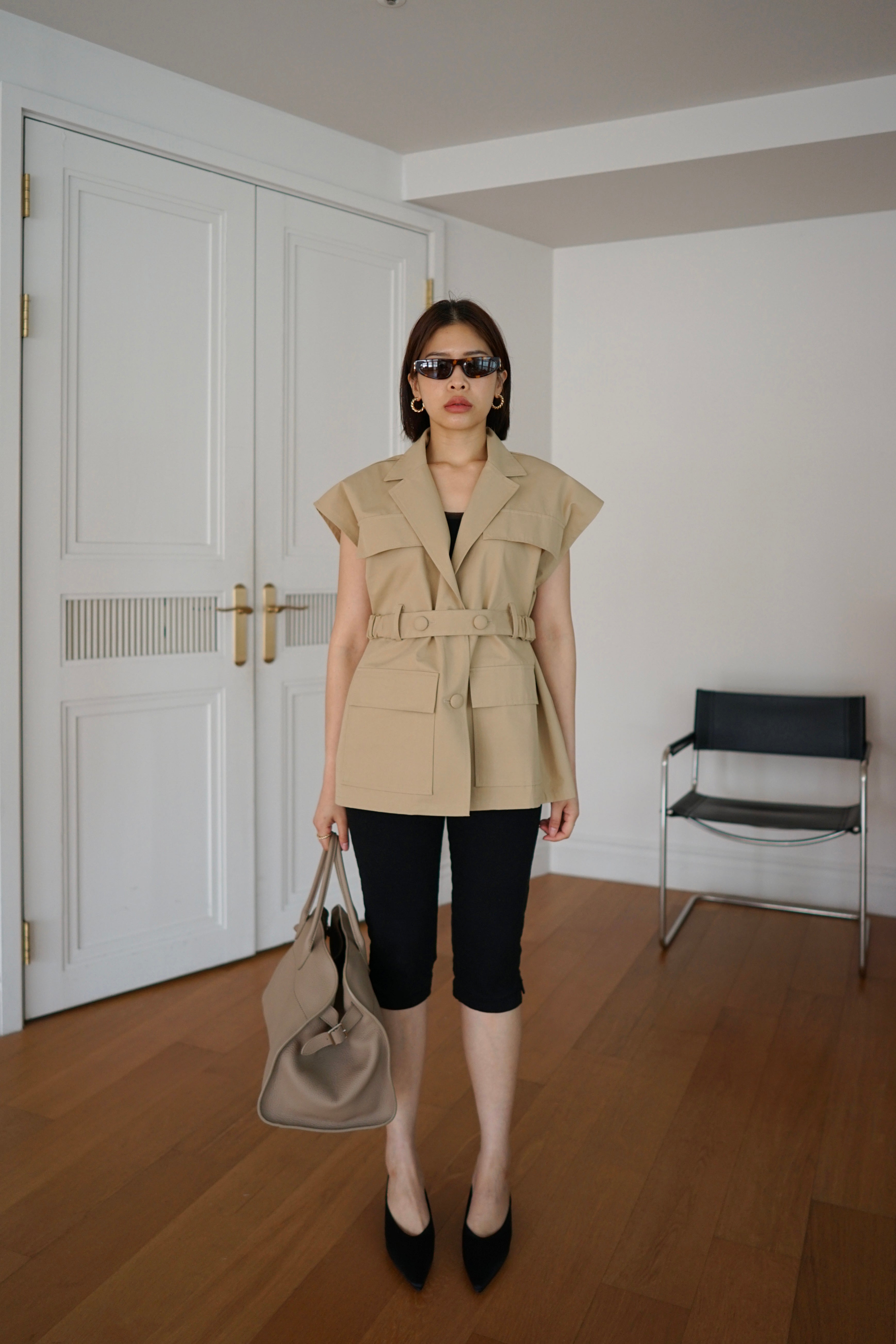Roma sleeveless jacket with belt