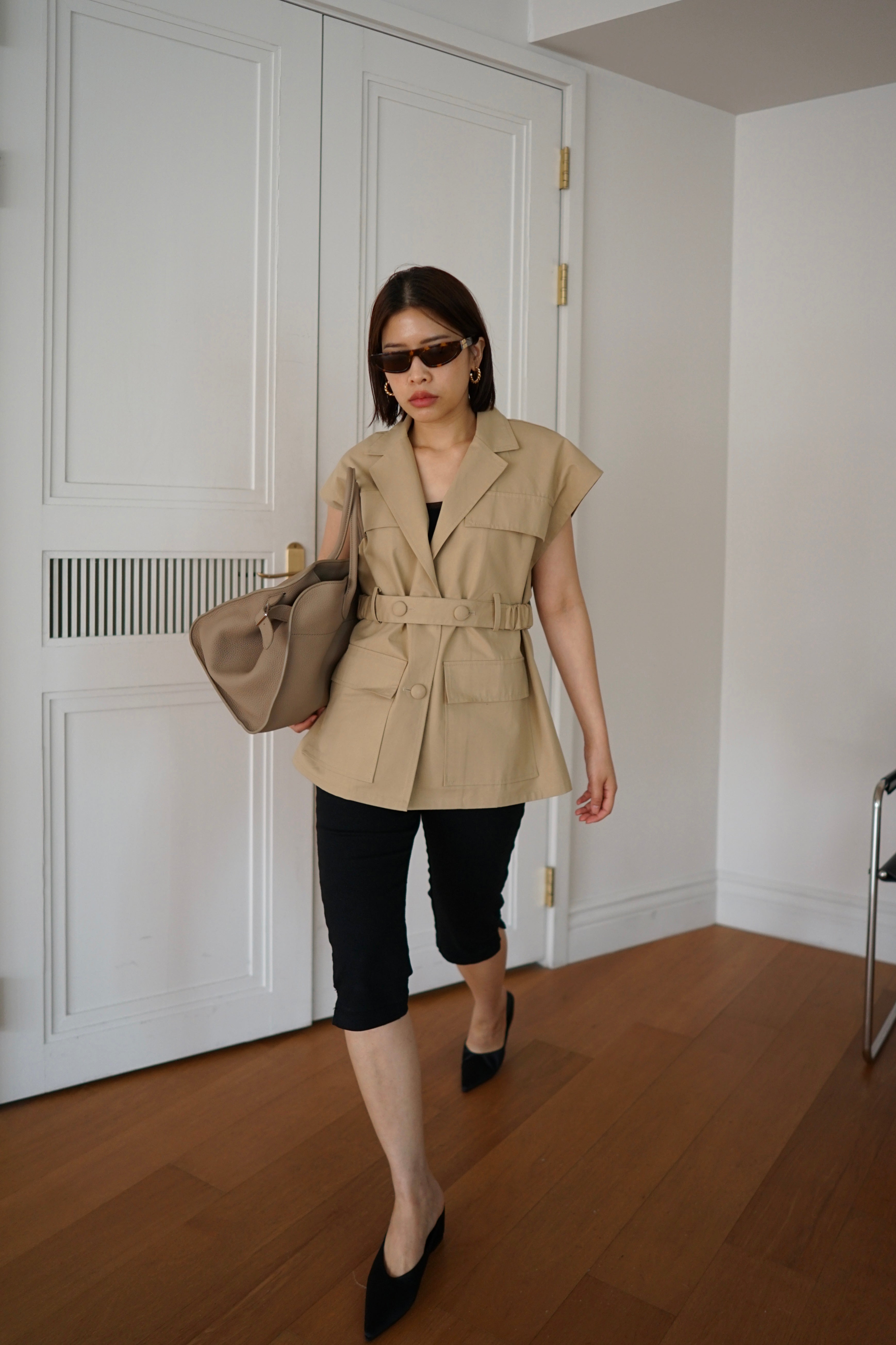 Roma sleeveless jacket with belt