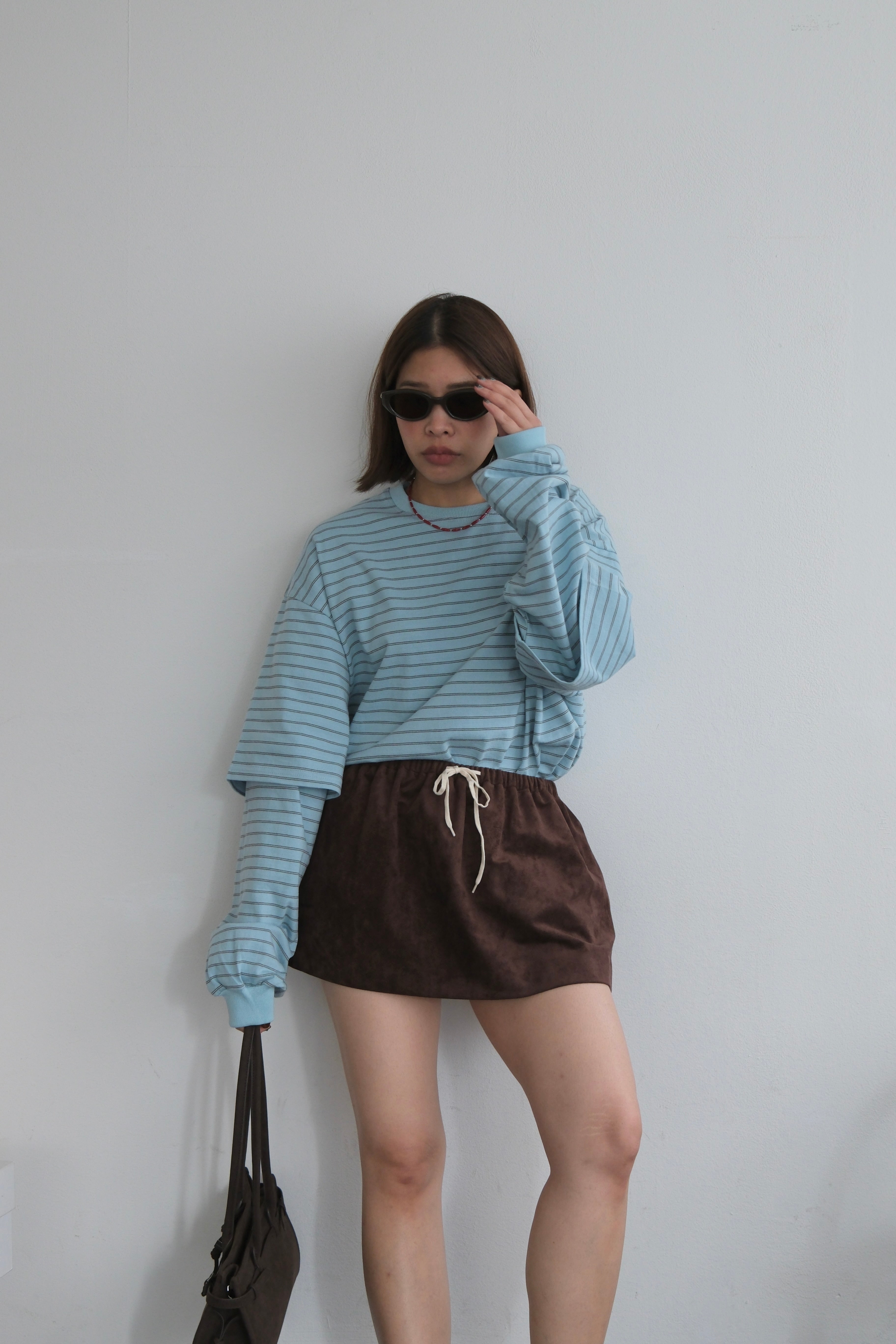 Faux suede drawstring mini skirt