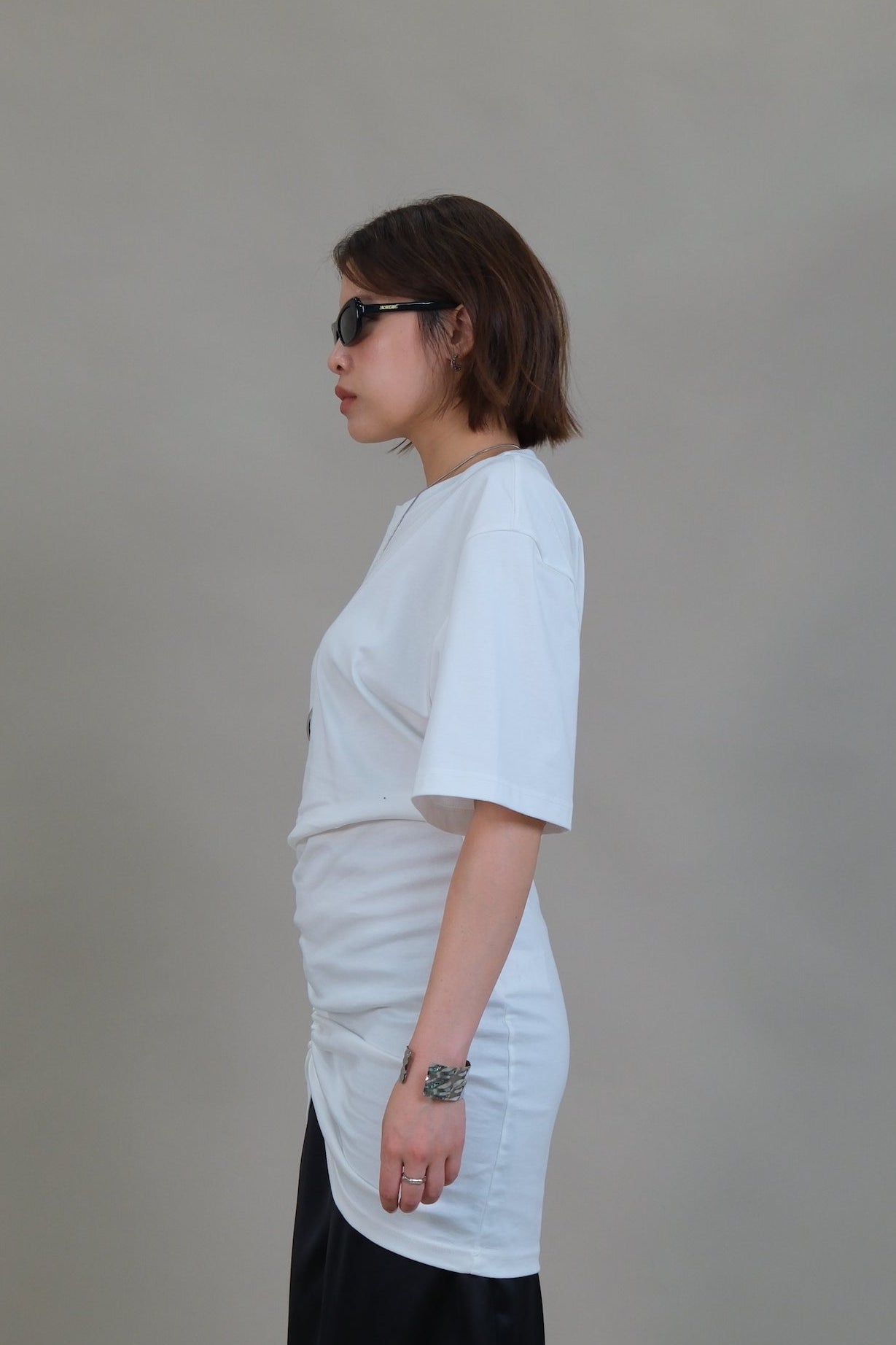 Sculpted Side-Ruching mini dress with removable shoulder pads