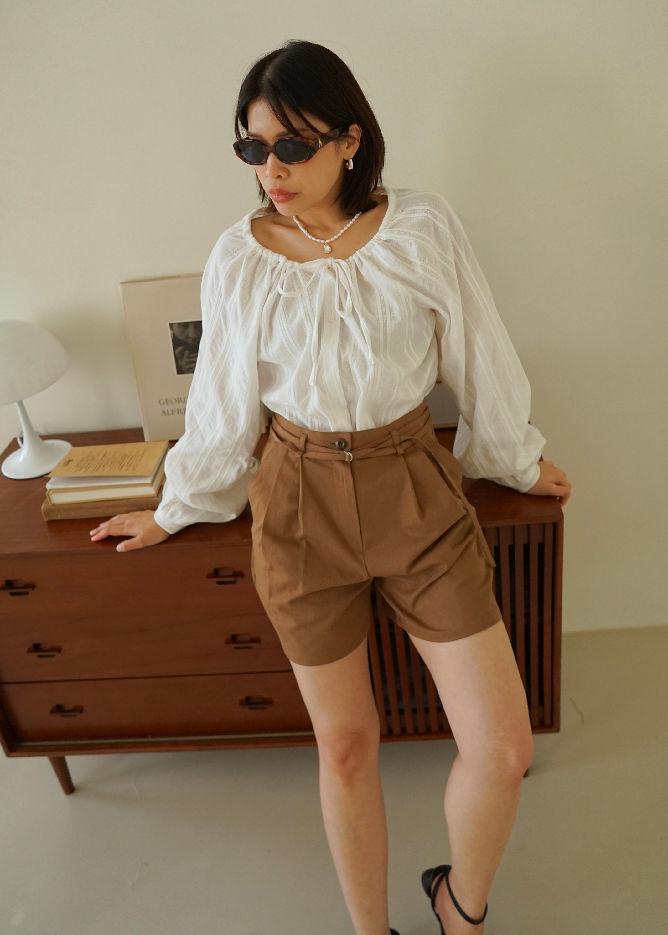 double belted pleated shorts