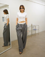elasticated waistband pleated trousers