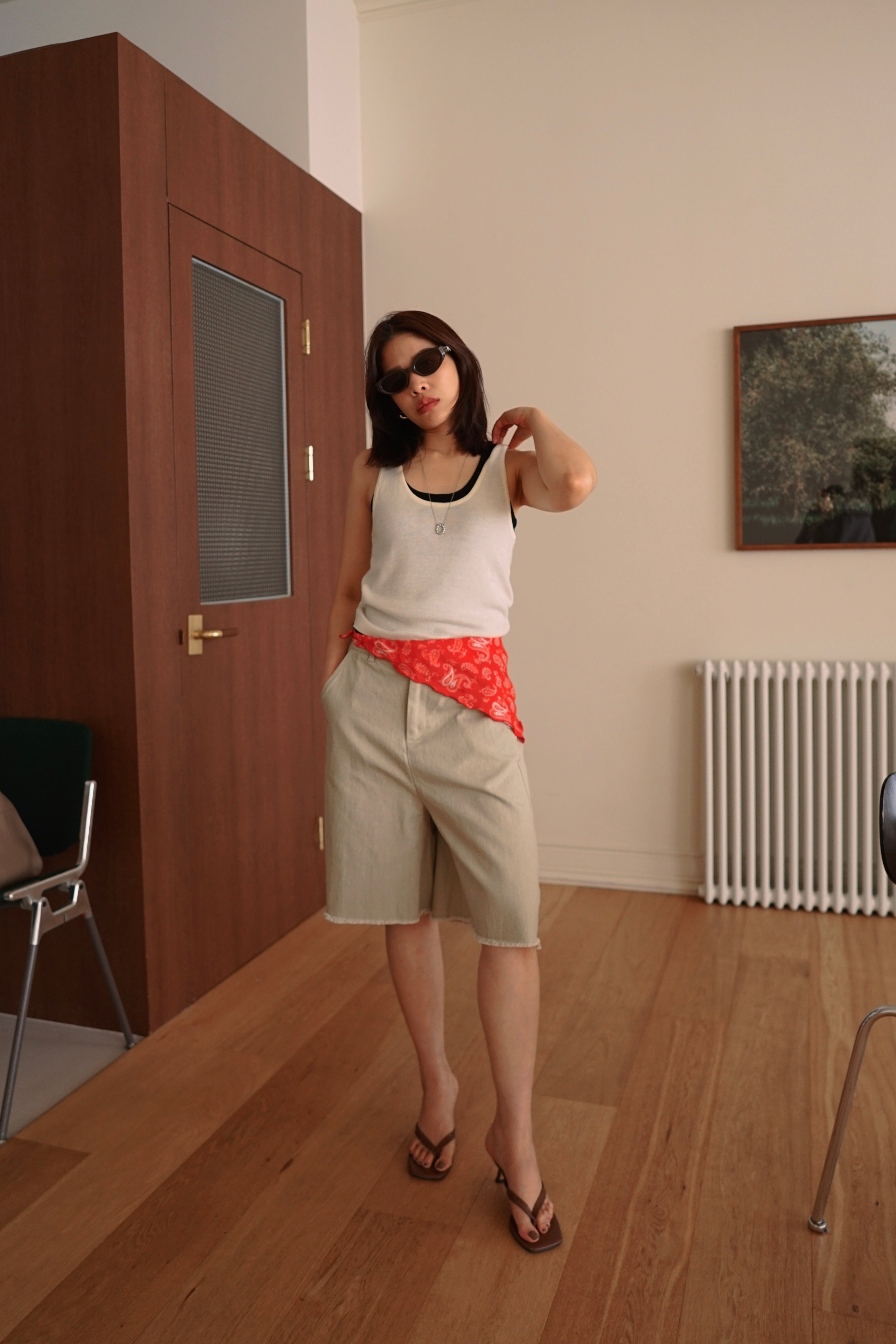 Relaxed fit denim bermuda shorts with frayed hem