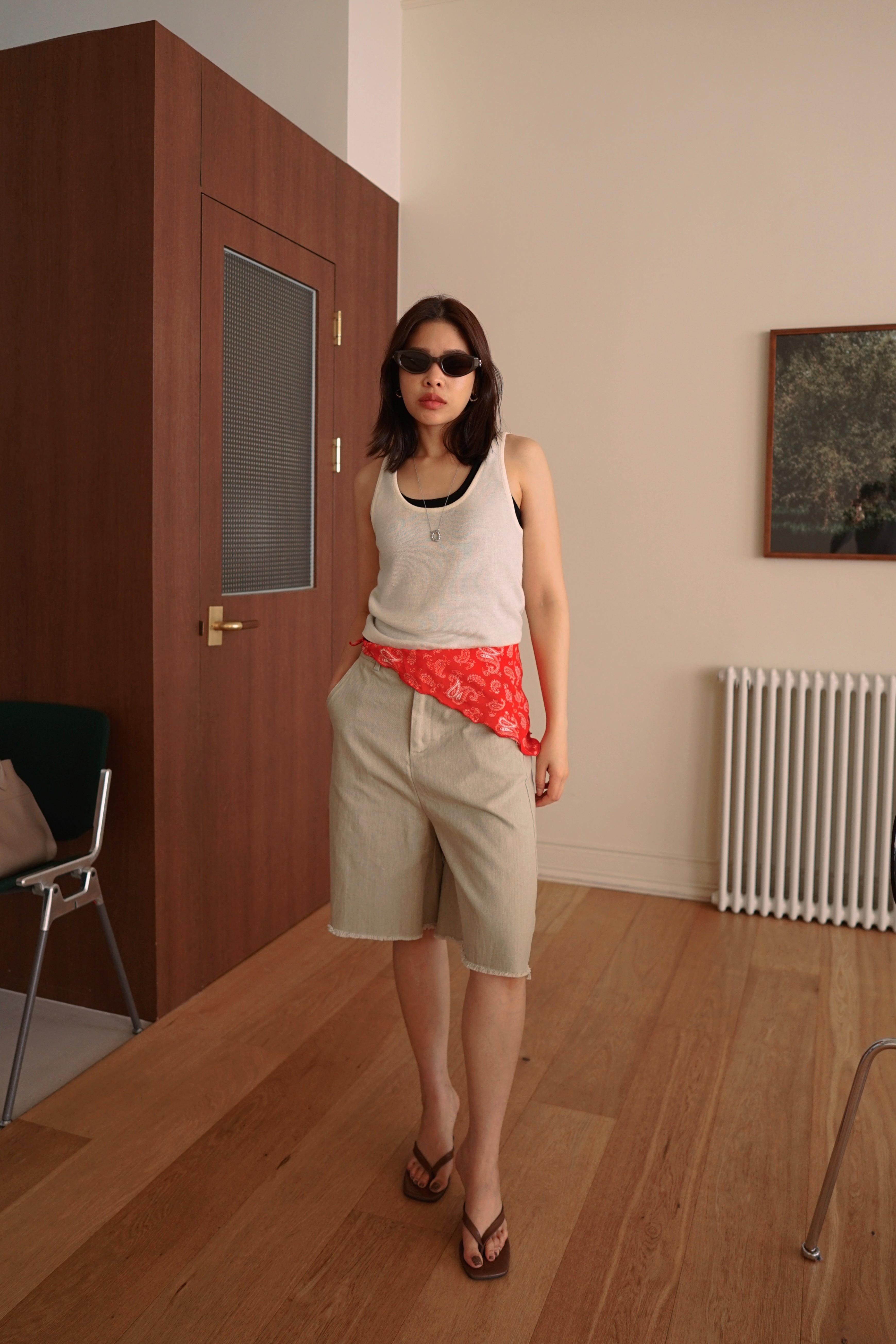 Relaxed fit denim bermuda shorts with frayed hem