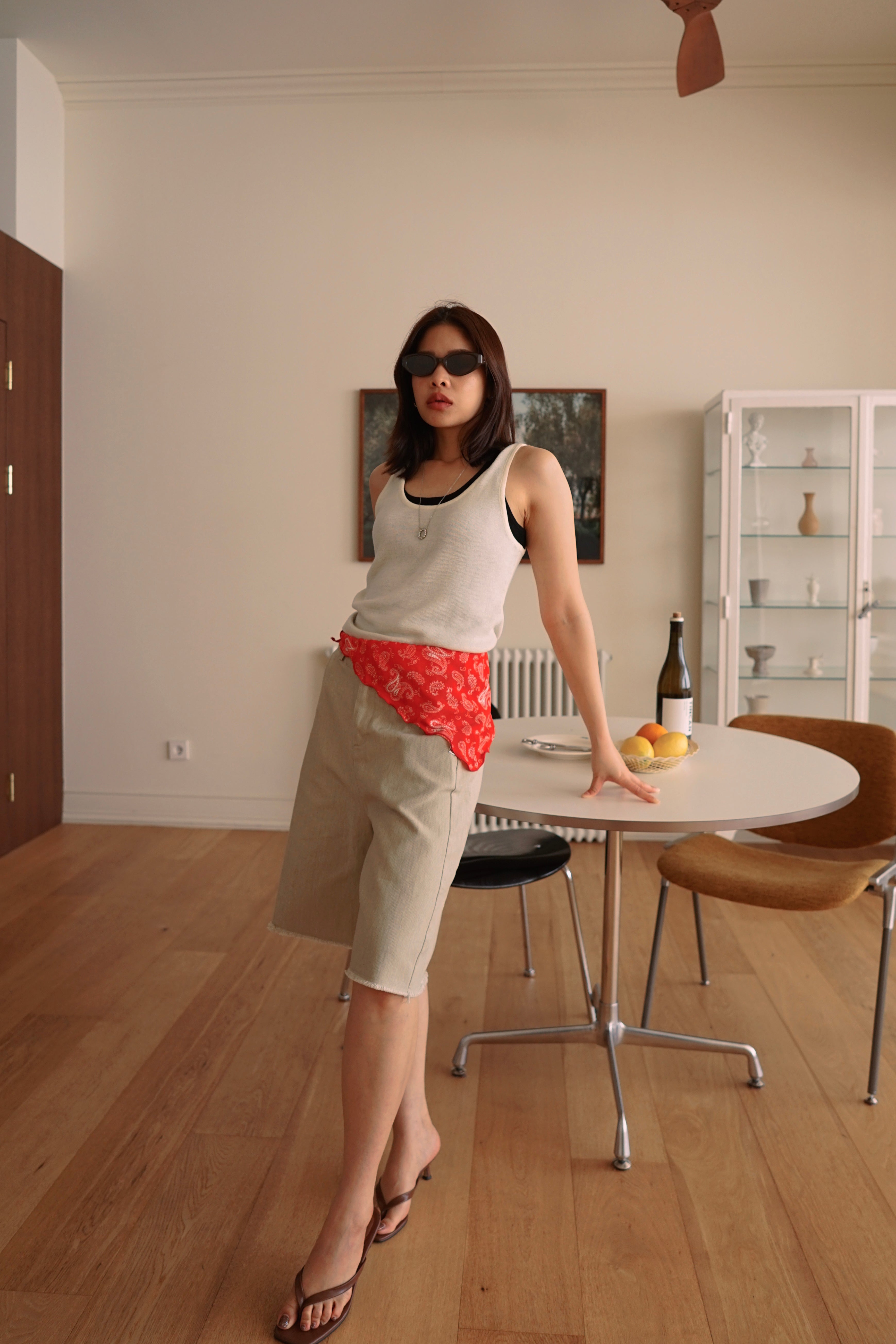 Relaxed fit denim bermuda shorts with frayed hem