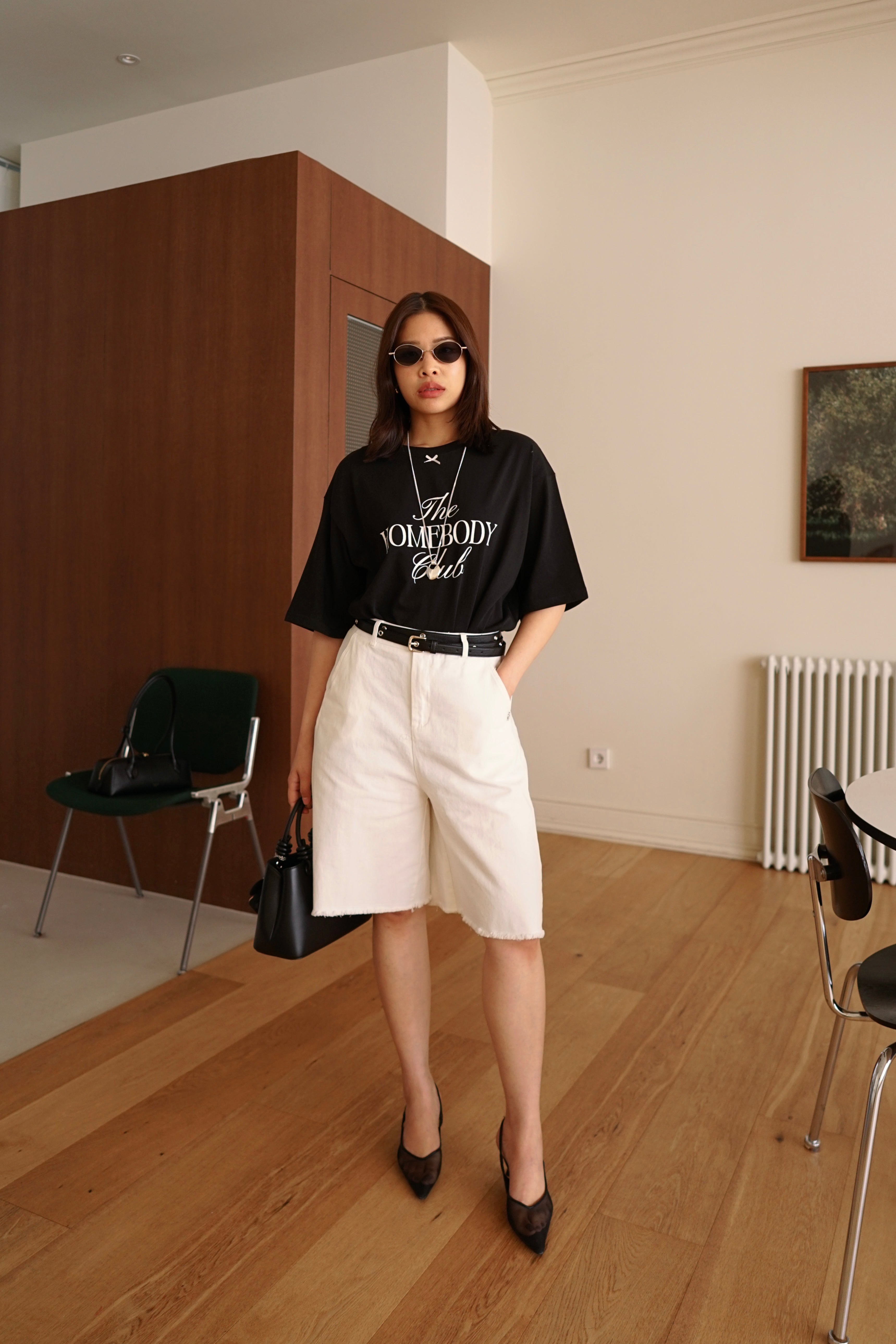 Relaxed fit denim bermuda shorts with frayed hem