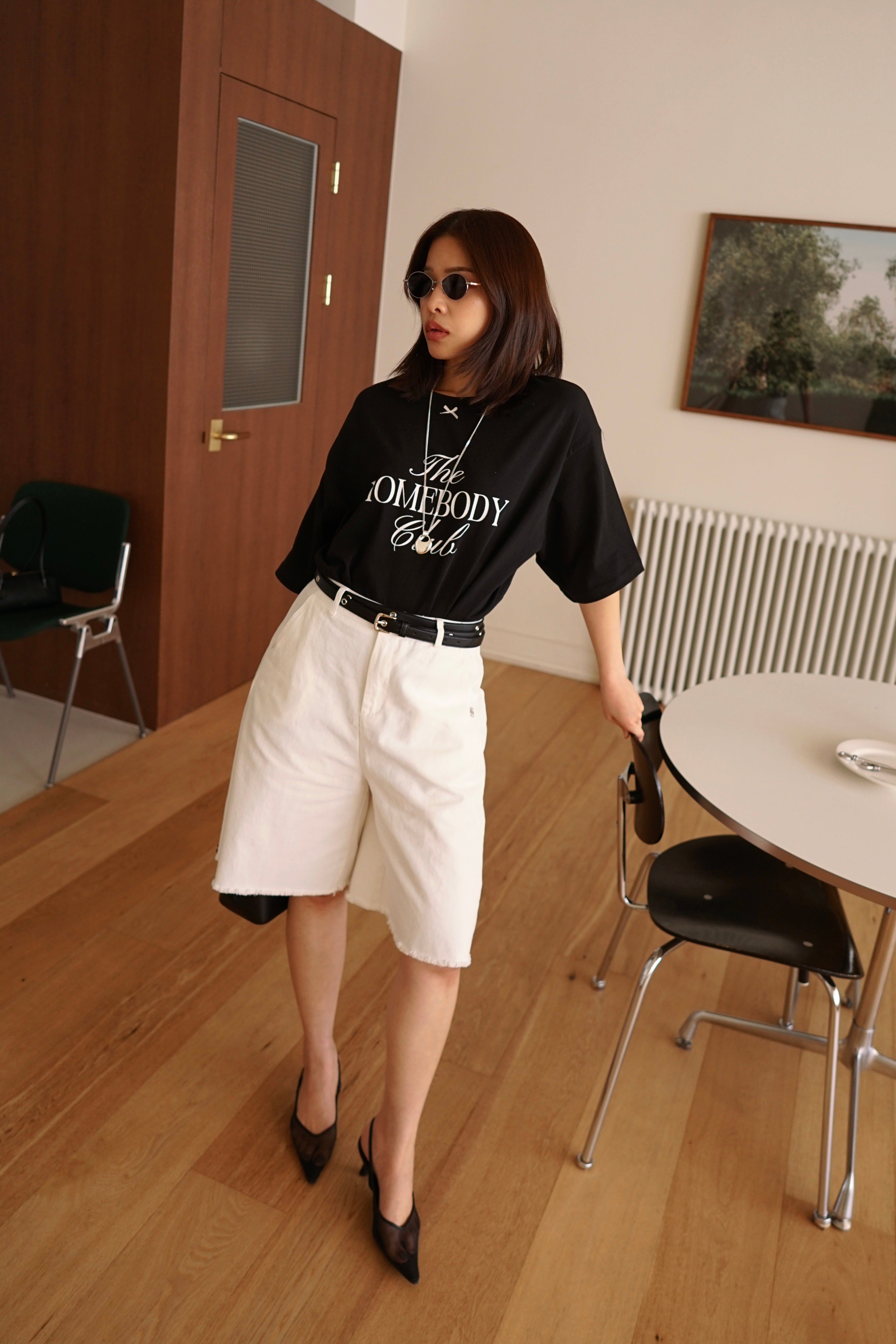 Relaxed fit denim bermuda shorts with frayed hem