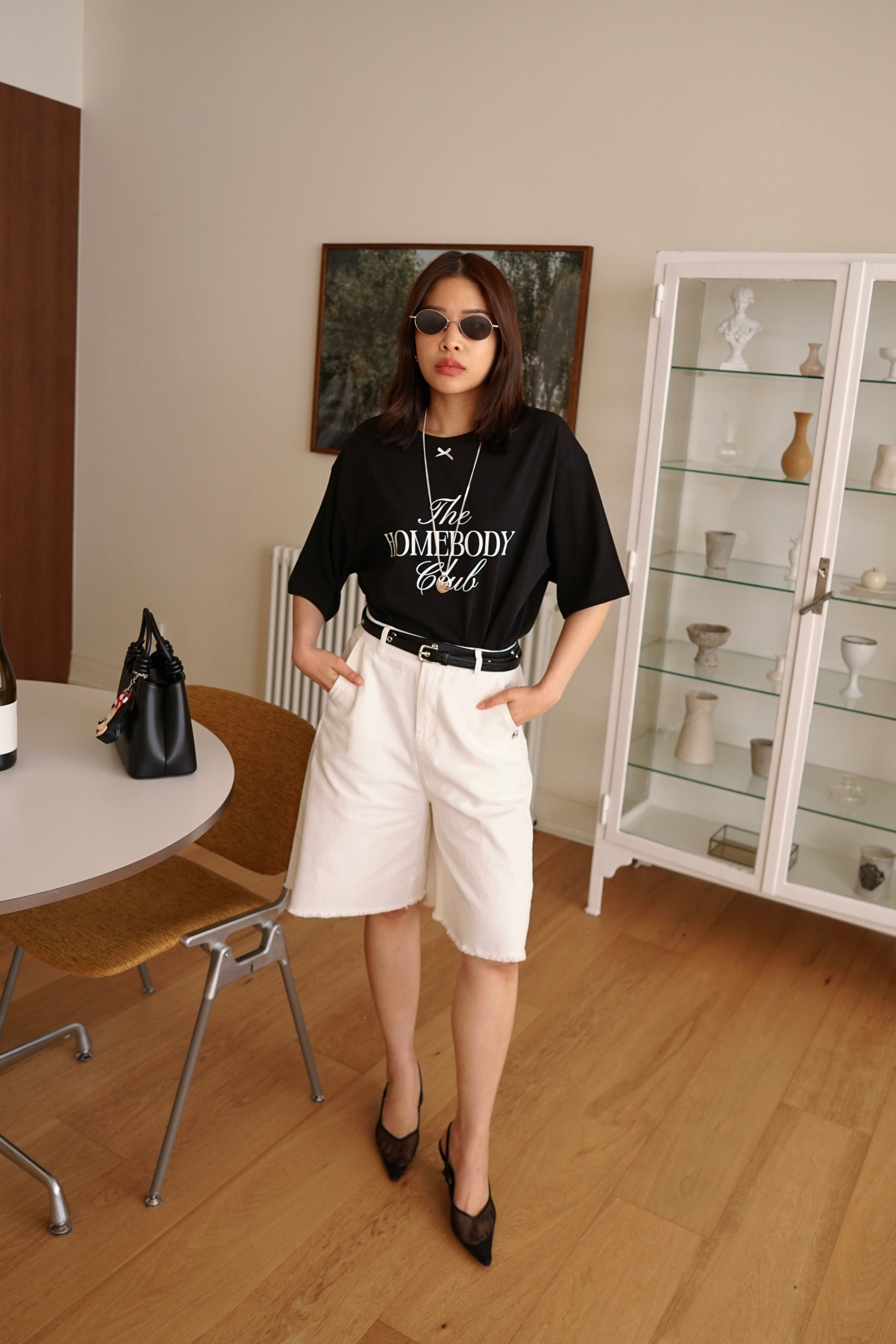 Relaxed fit denim bermuda shorts with frayed hem