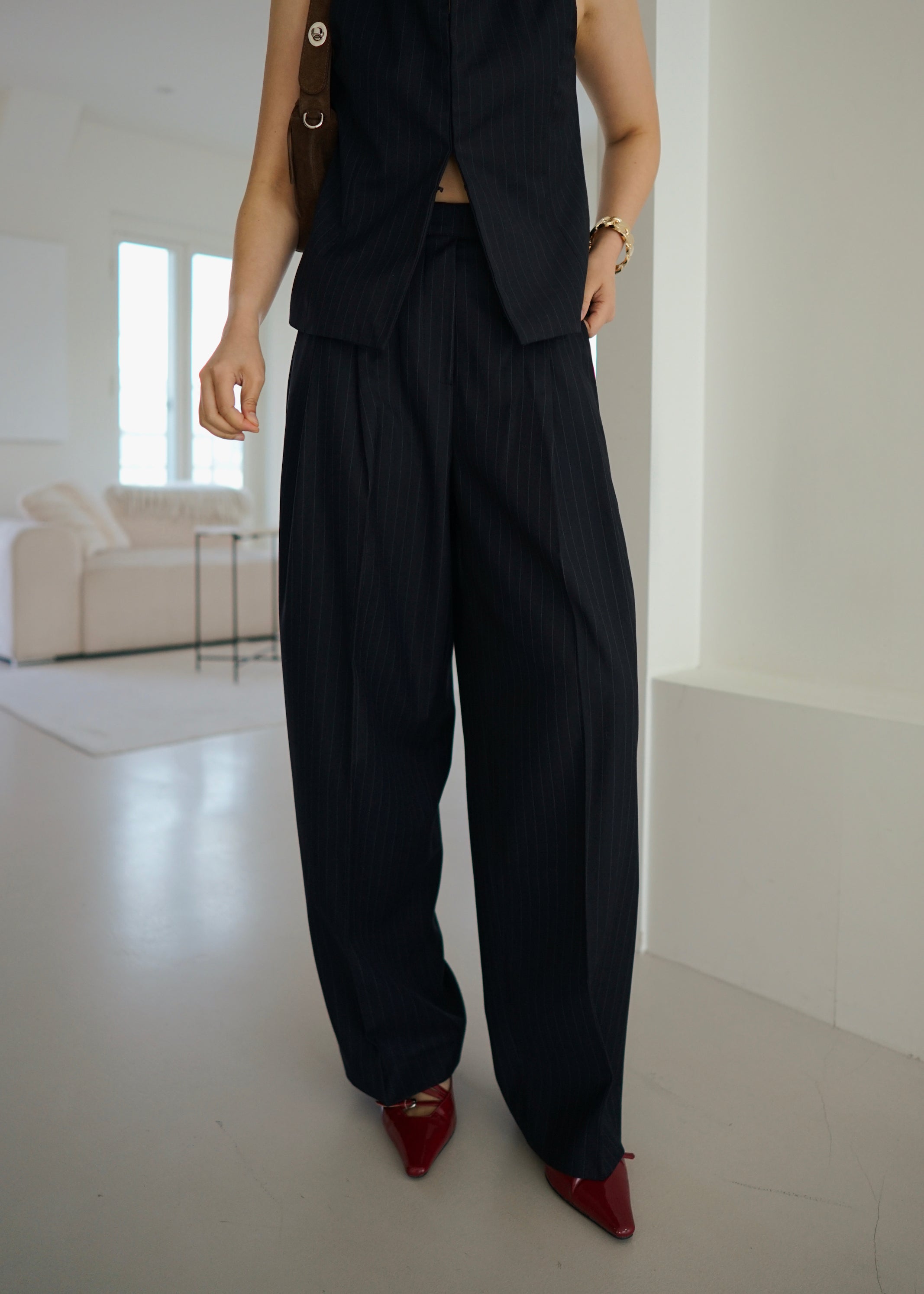 high rise stripe pleated trousers