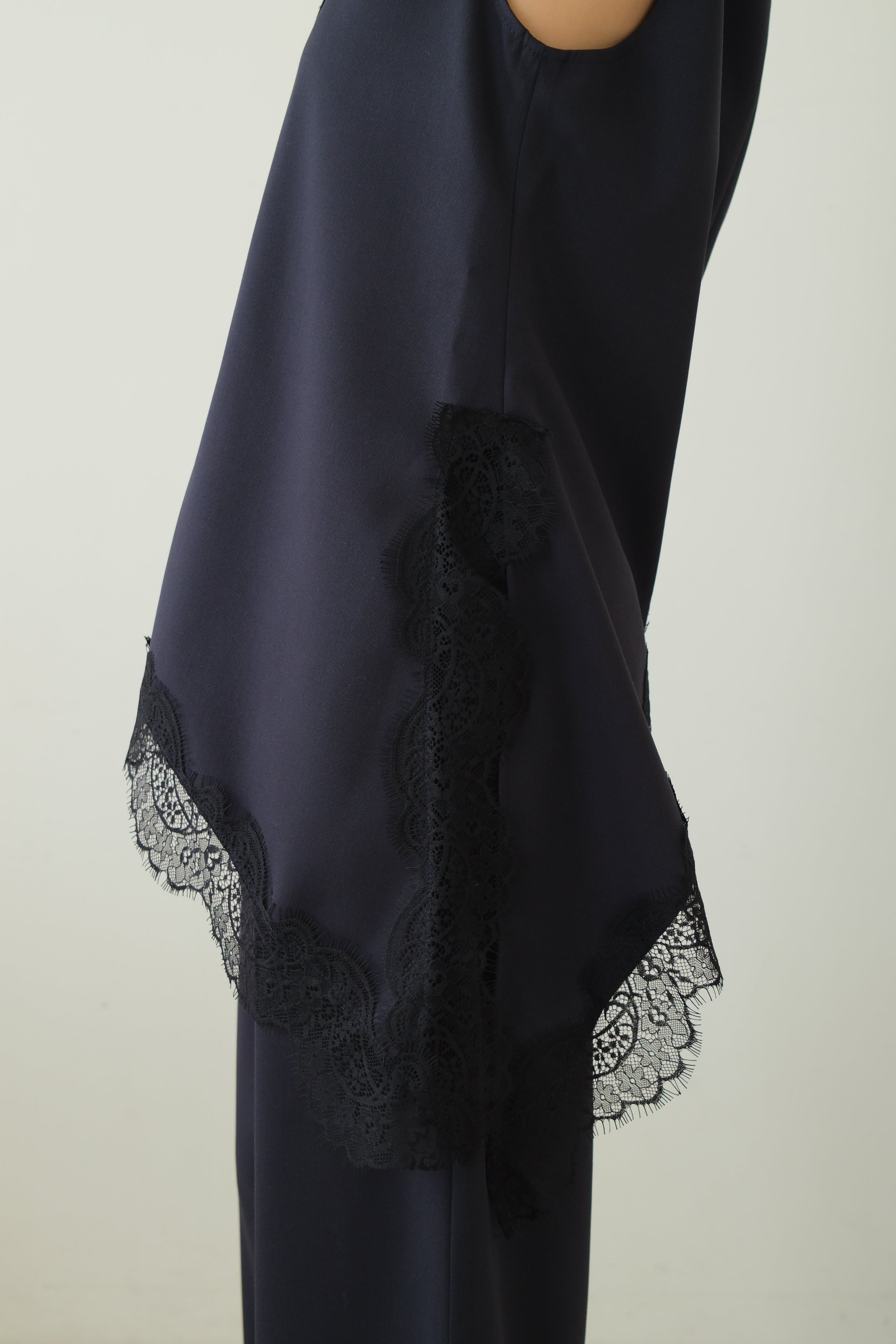 Norm Asymmetric V-Neck Lace Hem Vest