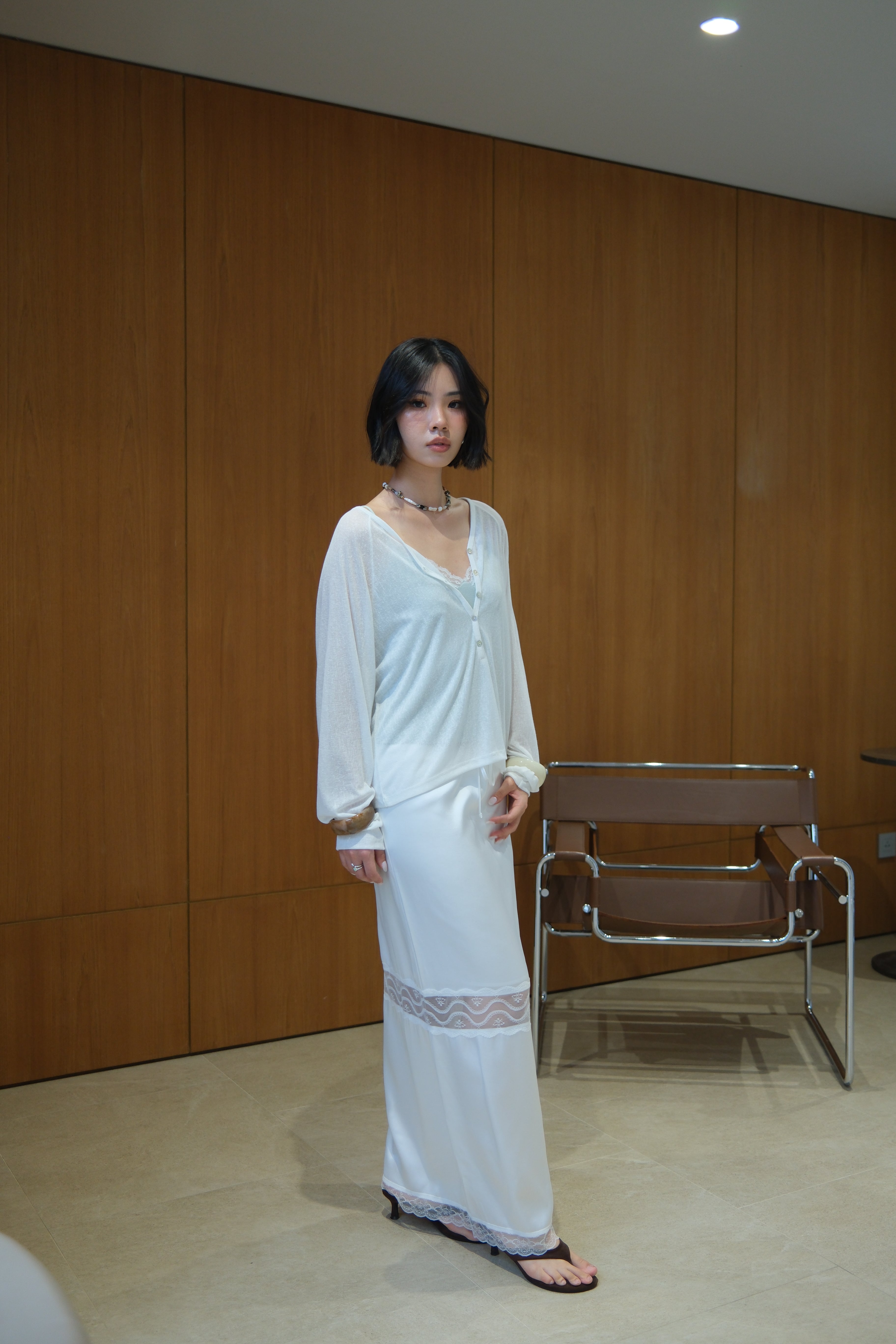 Linear V-Neck Half-Button Top