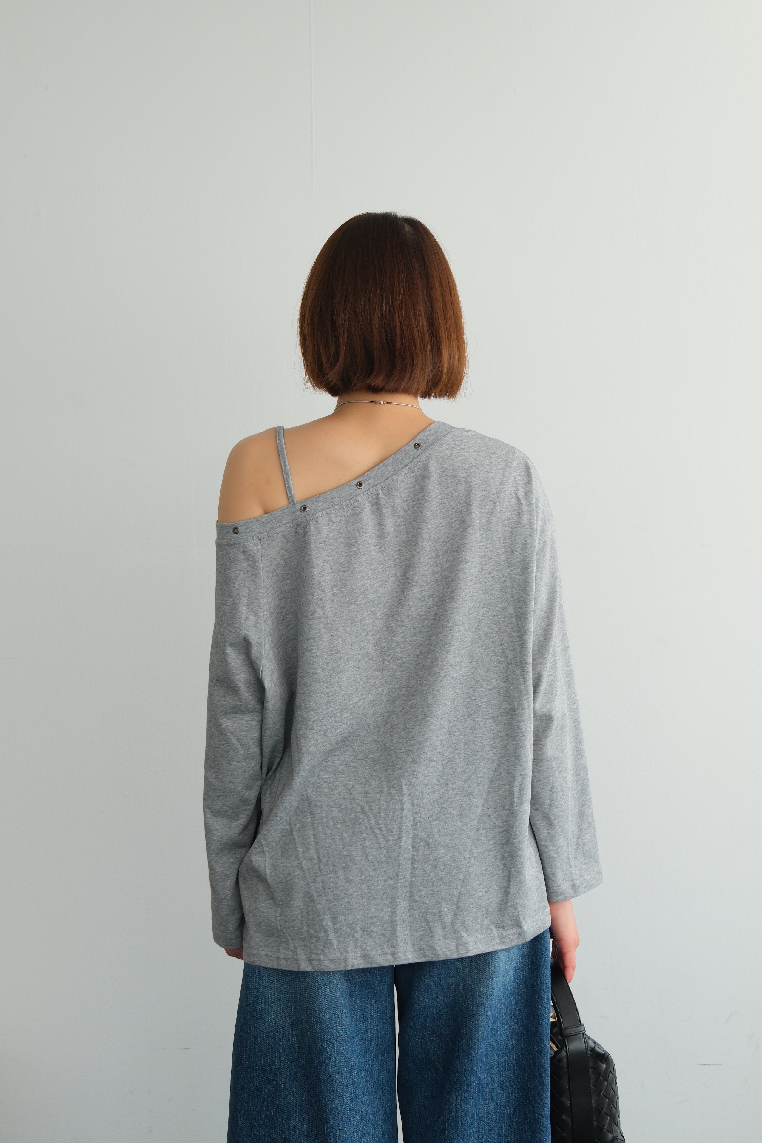 Asymmetric Shoulder Eyelet Top