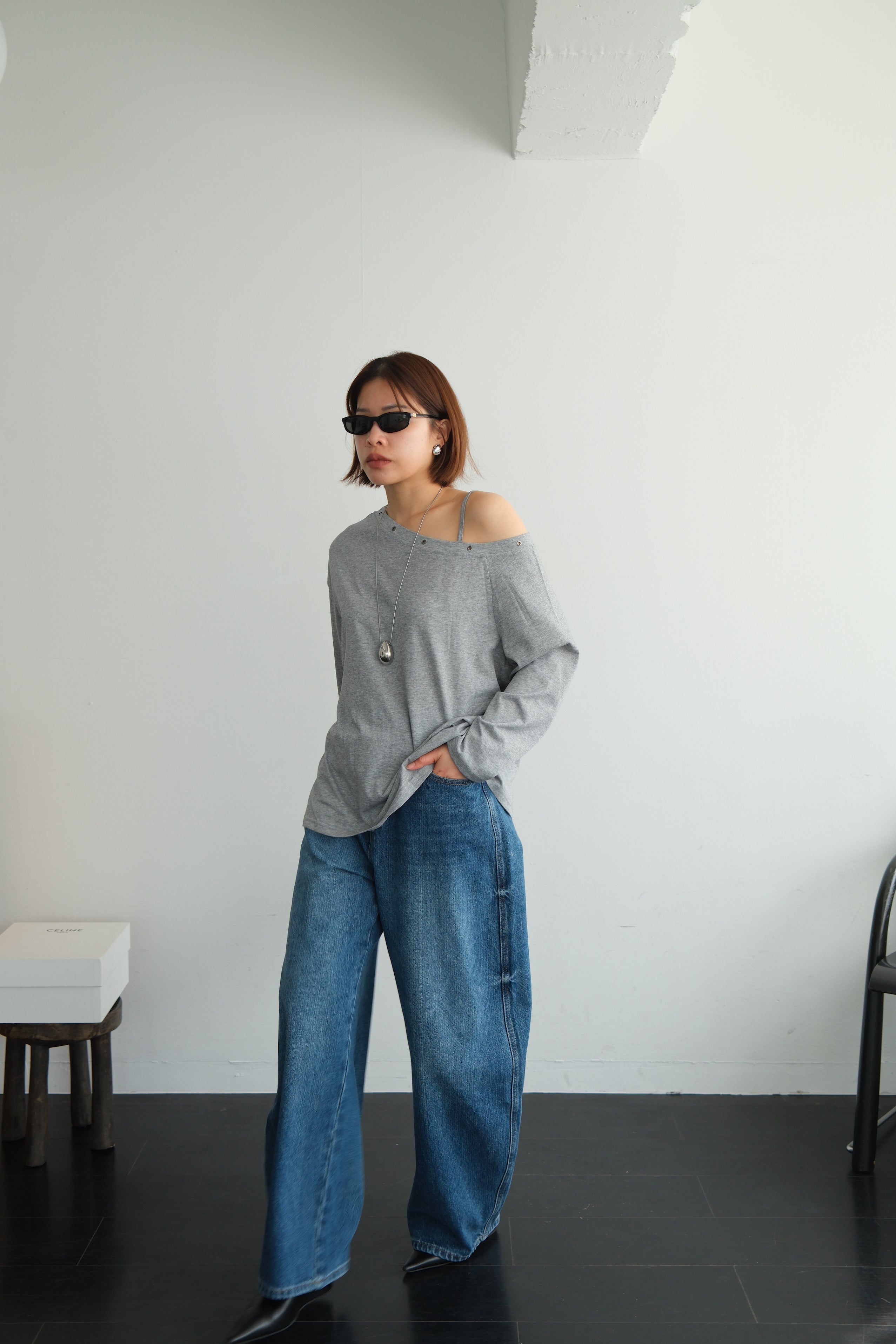 Asymmetric Shoulder Eyelet Top