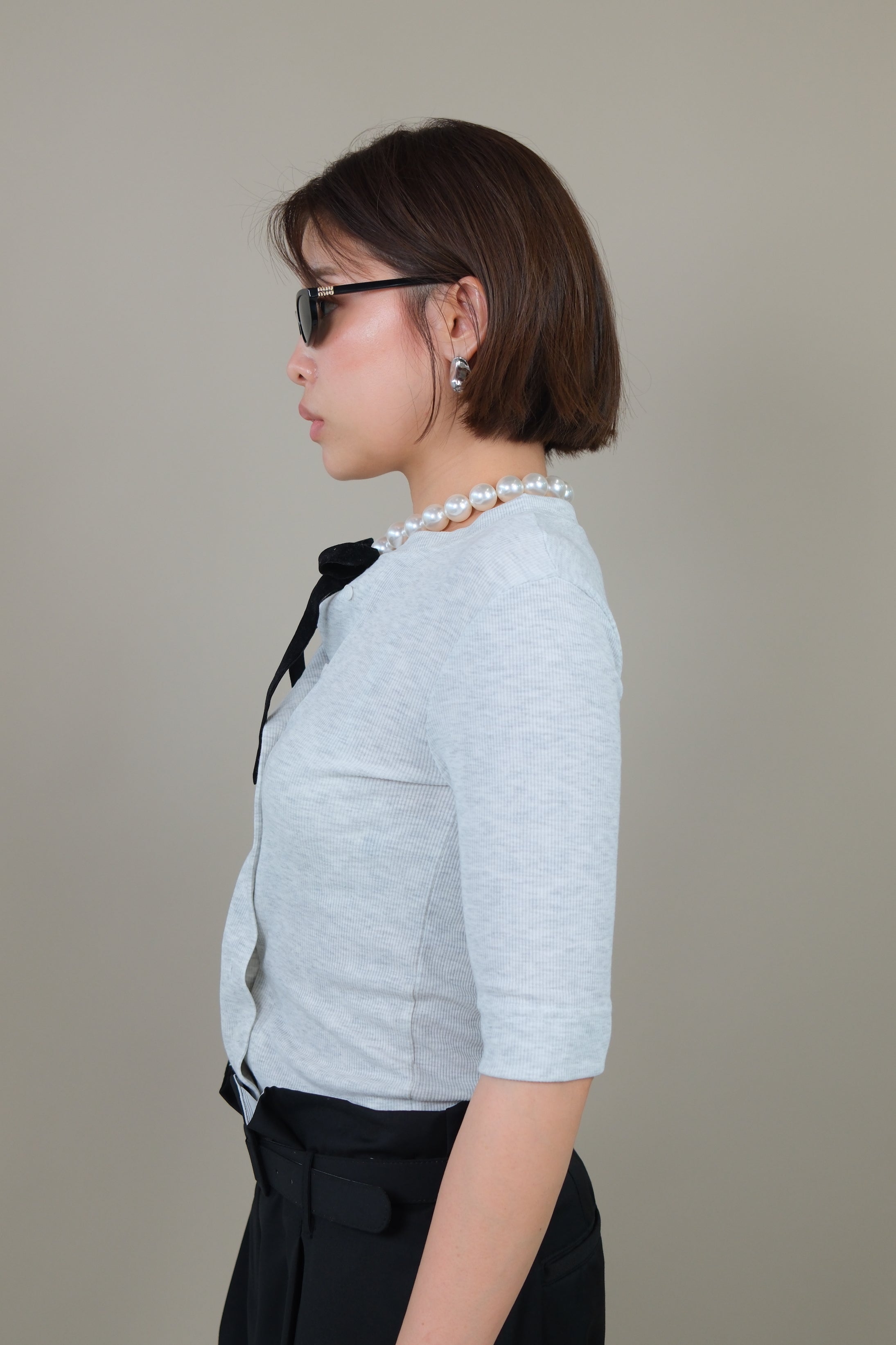 Messy buttoned cotton-ribbed top