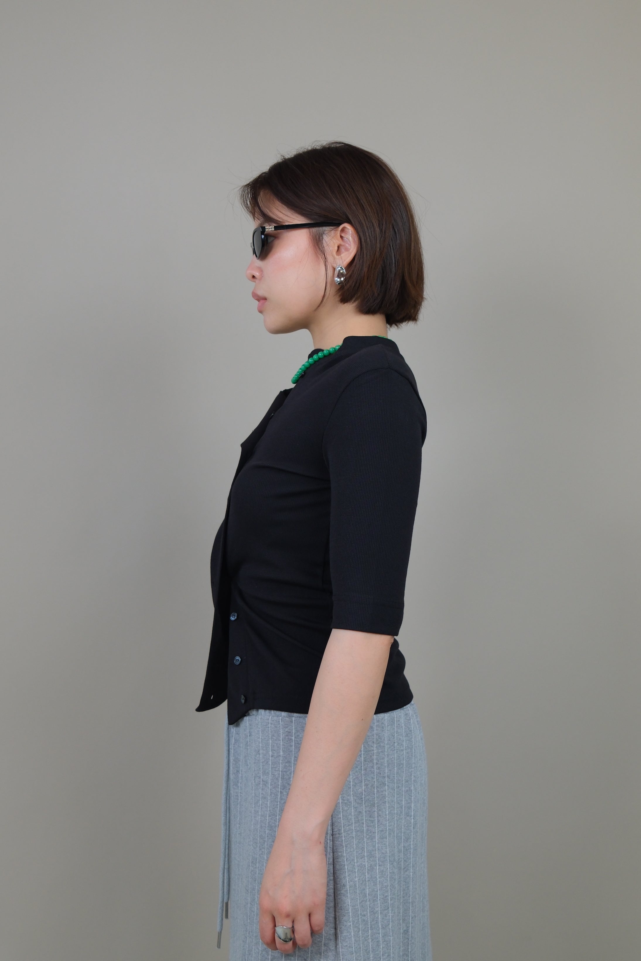 Messy buttoned cotton-ribbed top