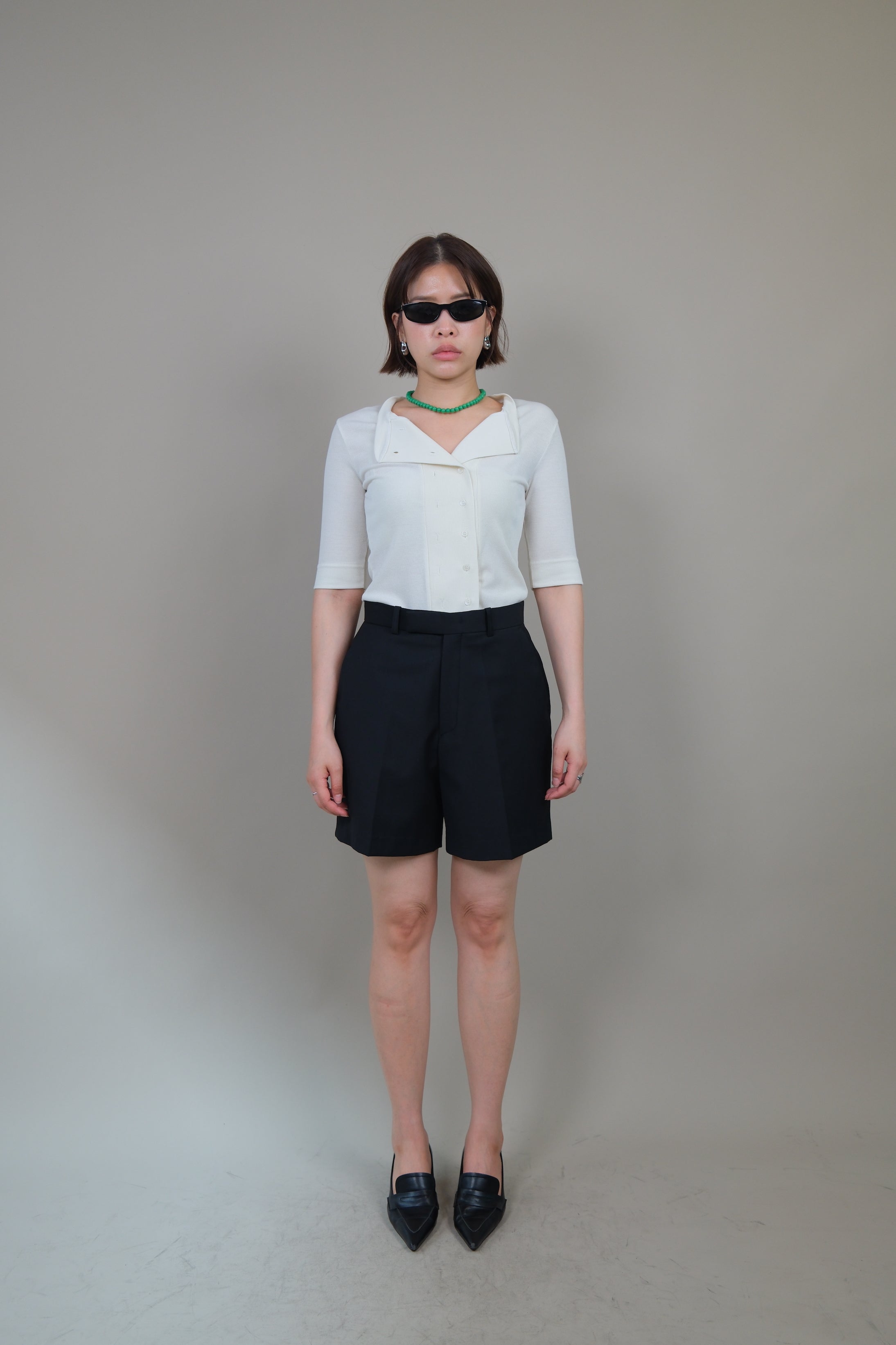 Messy buttoned cotton-ribbed top