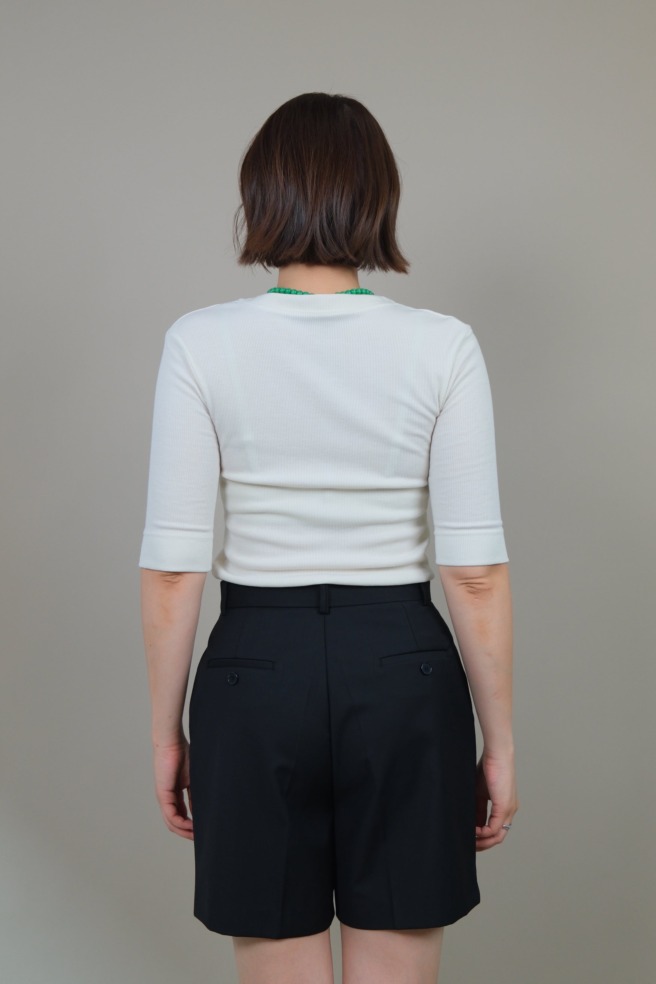 Messy buttoned cotton-ribbed top