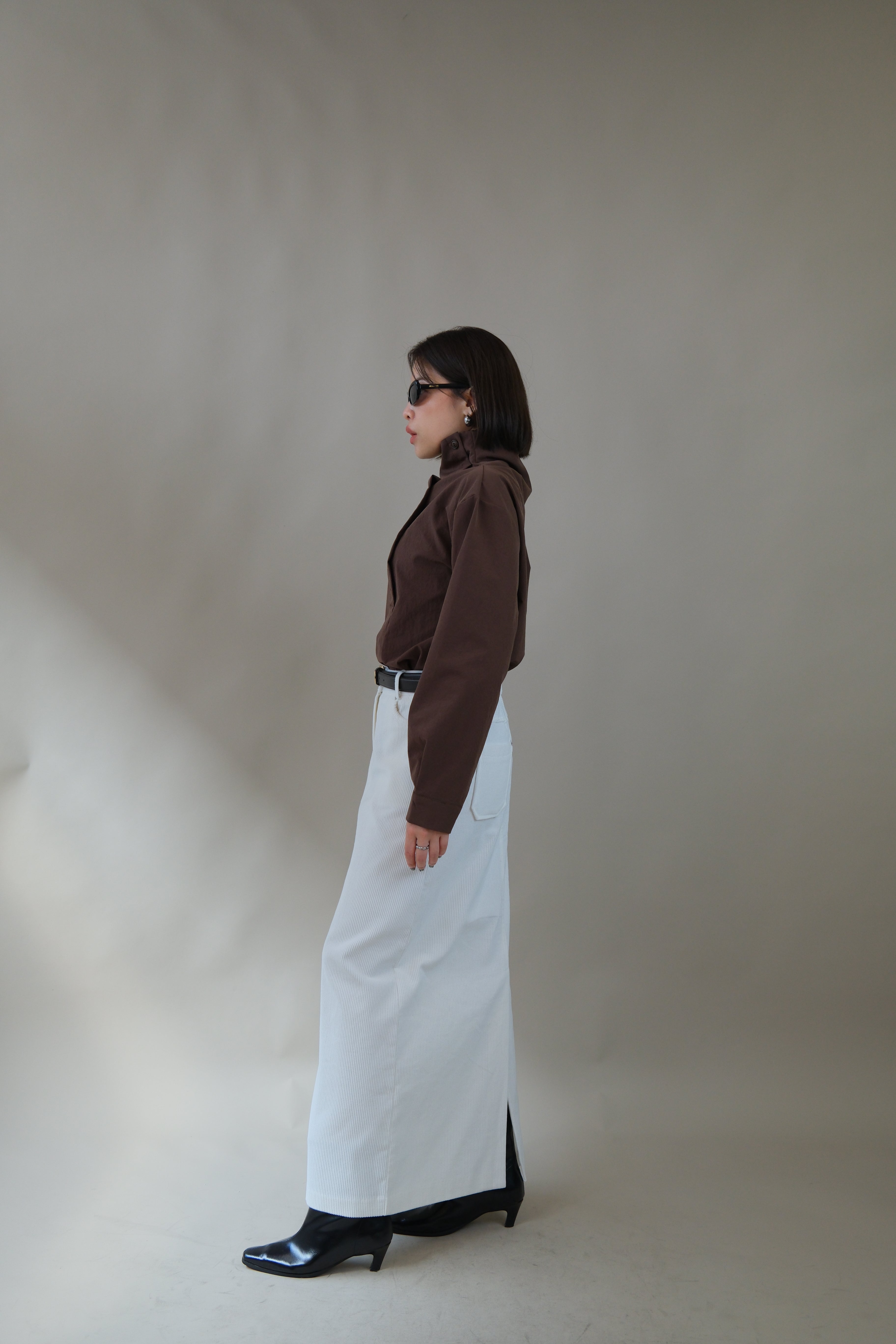 Funnel neck asym button blouse