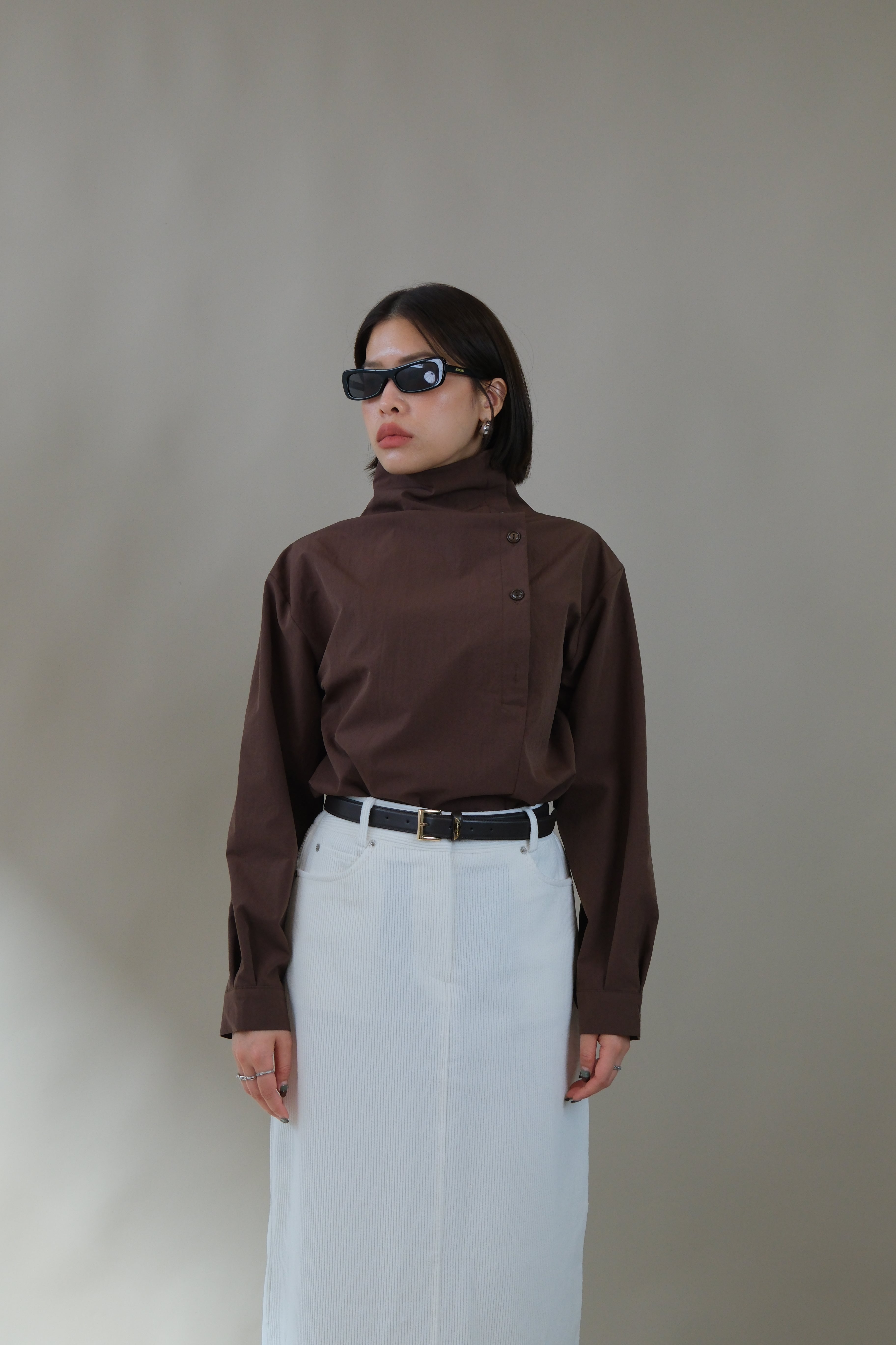 Funnel neck asym button blouse
