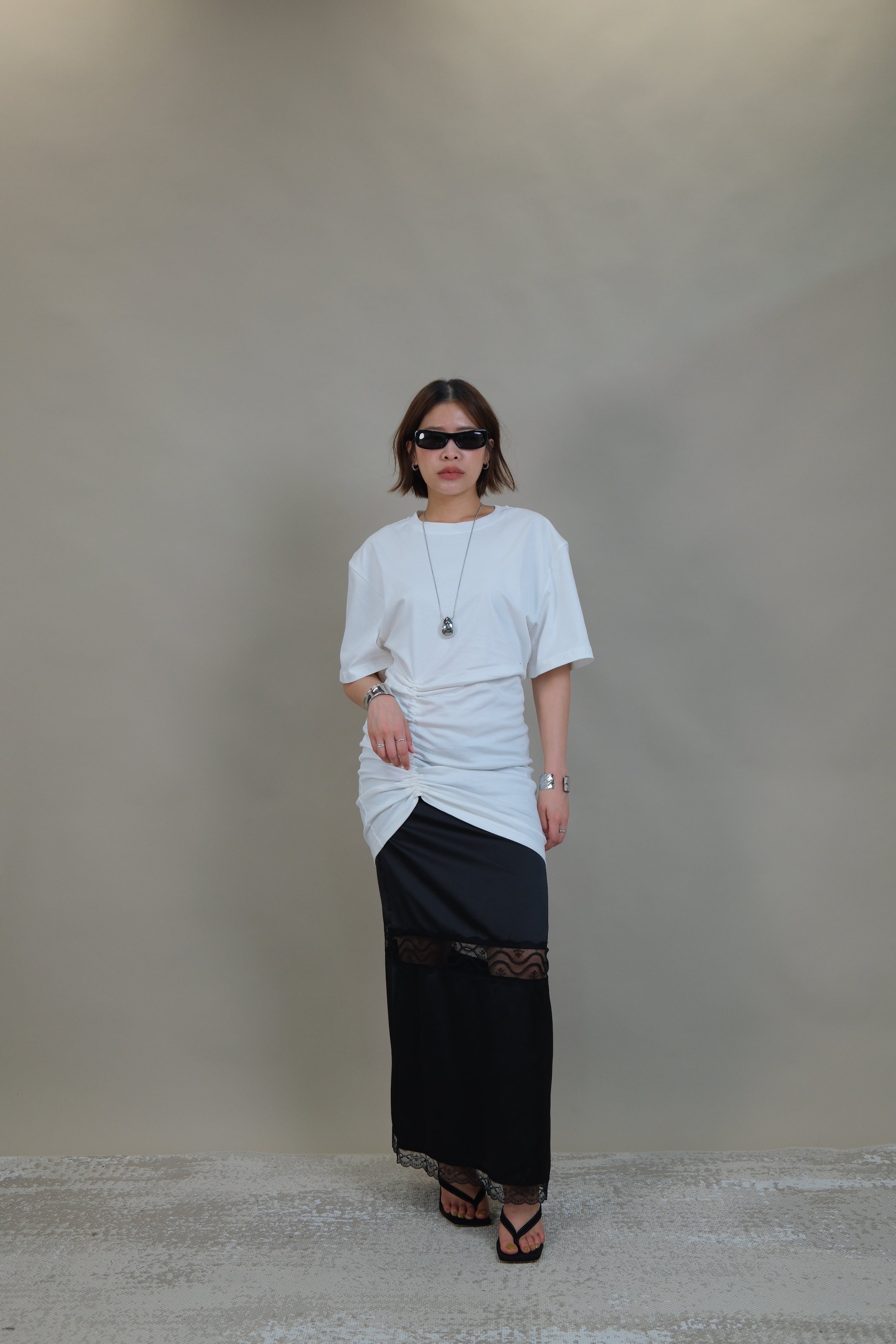 Sculpted Side-Ruching mini dress with removable shoulder pads